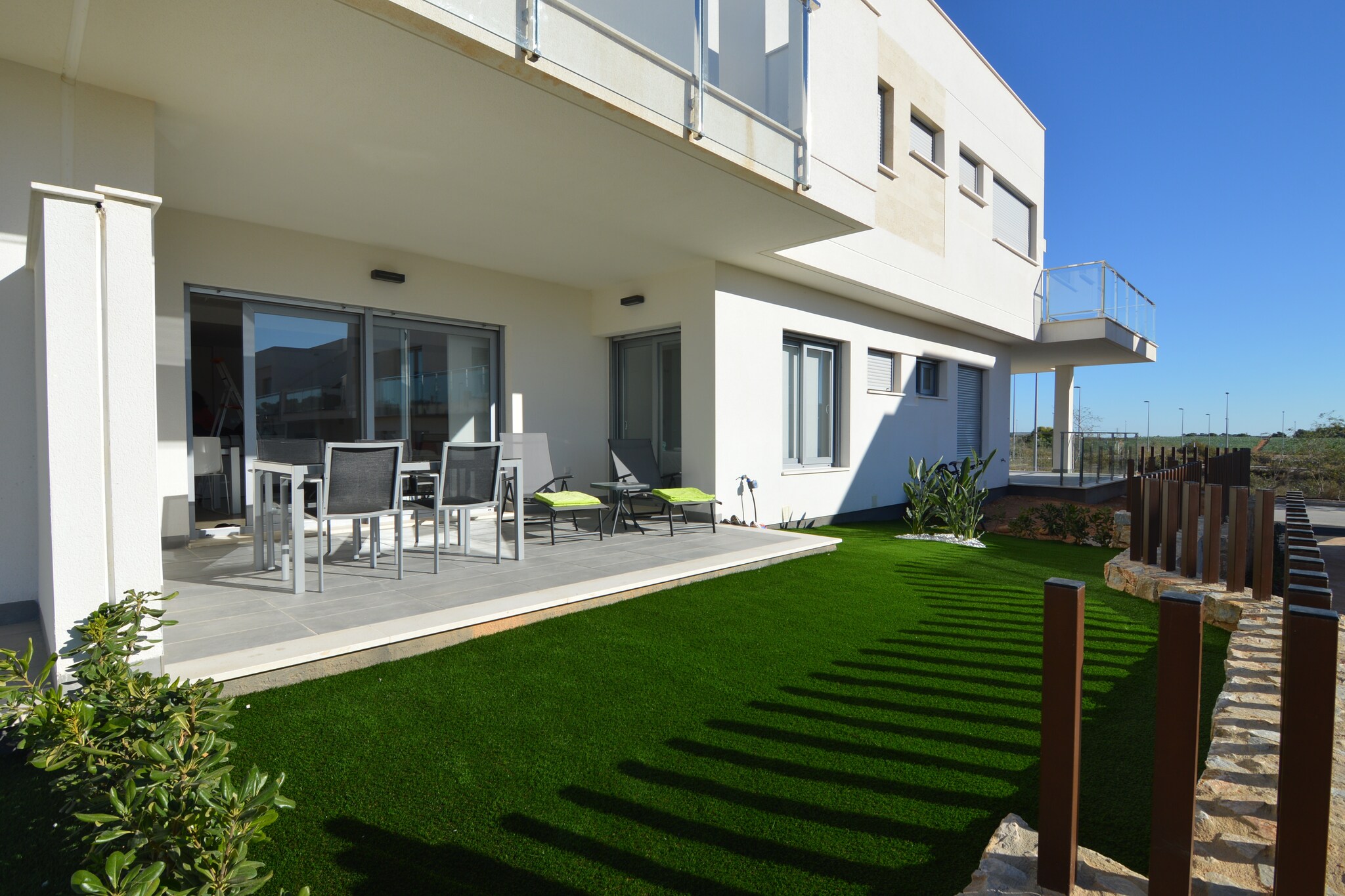 An optional utilities and service fee of EUR 100,00 will be charged before your arrival. Details are given below.<br> Relaxed Family Escape
Located in the peaceful area of Los Montesinos, this holiday home offers a welcoming retreat for families or small groups. With three bedrooms accommodating up to six guests, the interiors are designed for both comfort and function. The open-plan living room includes a dining space, modern kitchen with all essentials, and air conditioning for a pleasant stay year-round. Large windows and a private terrace invite natural light, while the shared swimming pool-complete with a shallow section for children-provides a refreshing break during sunny afternoons. Leisure and Surroundings
Just 500 meters away lies Vistabella Golf, making this home an ideal choice for golf enthusiasts. For everyday convenience, supermarkets are within walking distance, while Torrevieja's lively town center is 17 km away, offering sandy beaches, a bustling marina, and evening strolls along the promenade. Guests can also enjoy the on-site boules court or use the available bike to explore the surrounding neighborhoods at a slower pace. Dining and Local Flavors
The area around Orihuela and Torrevieja offers plenty of dining options, from traditional Spanish tapas bars to international restaurants by the sea. Guests can enjoy fresh seafood, family-run eateries in nearby villages, or stylish beachside lounges overlooking the Mediterranean. With Alicante Airport just 58 km away, the home is easily accessible for both short getaways and longer holidays. <br><b> Optional Utilities & Service Package </b><br><b> An optional utilities and service package of EUR 100,00 </b> can be selected prior to your arrival. You will receive a separate communication with the payment link should you wish to include it.<br>This package ensures a seamless stay and conveniently covers services such as final cleaning, utility consumption, service support, and protection against minor damages or incidental costs during your stay.<br>Guests who prefer may manage these services independently, provided the property is returned in good order at check-out.