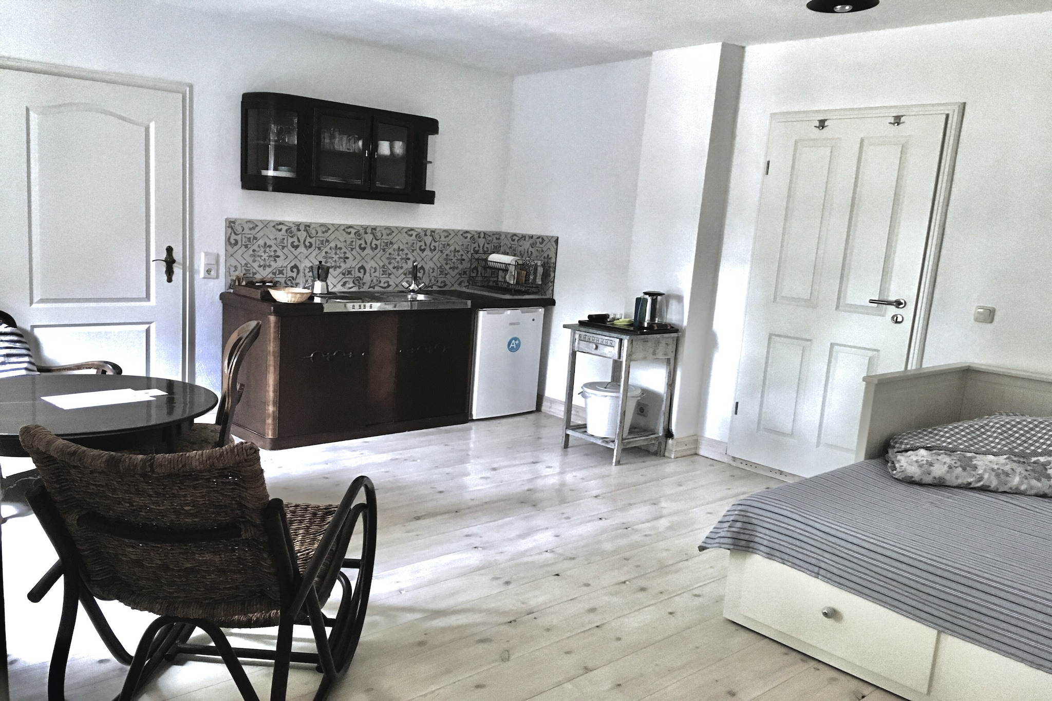 This charming no-pets holiday home in Neuburg offers a peaceful retreat just 2 km from the town center and 13 km from the historic Hanseatic city of Wismar. Ideal for couples or solo travelers, it’s a great base for exploring the Baltic Sea region. Visit Wismar’s Old Harbor, the Gothic-style Wassertor, and the expansive Marktplatz, one of Germany’s largest town squares. The nearby island of Poel and the beaches of Rerik and Kühlungsborn offer scenic day trips.
The home features a compact open kitchen with a coffee machine, fridge-freezer, and two-ring stove, perfect for preparing simple meals. The living/bedroom includes a double trundle bed and a dining table for two, while the bathroom is equipped with a shower and toilet. Heating ensures comfort year-round, and a high chair is available for added convenience. Outdoors, guests can relax on the terrace or in the garden, complete with furniture and private parking.
Surrounded by quiet countryside, the area offers a mix of nature and local flavor. Enjoy fresh seafood and regional dishes at nearby restaurants in Neuburg or head into Wismar for more variety. Whether you're cycling along the coast, visiting historic landmarks, or simply unwinding in the garden, this home offers a restful Baltic escape.