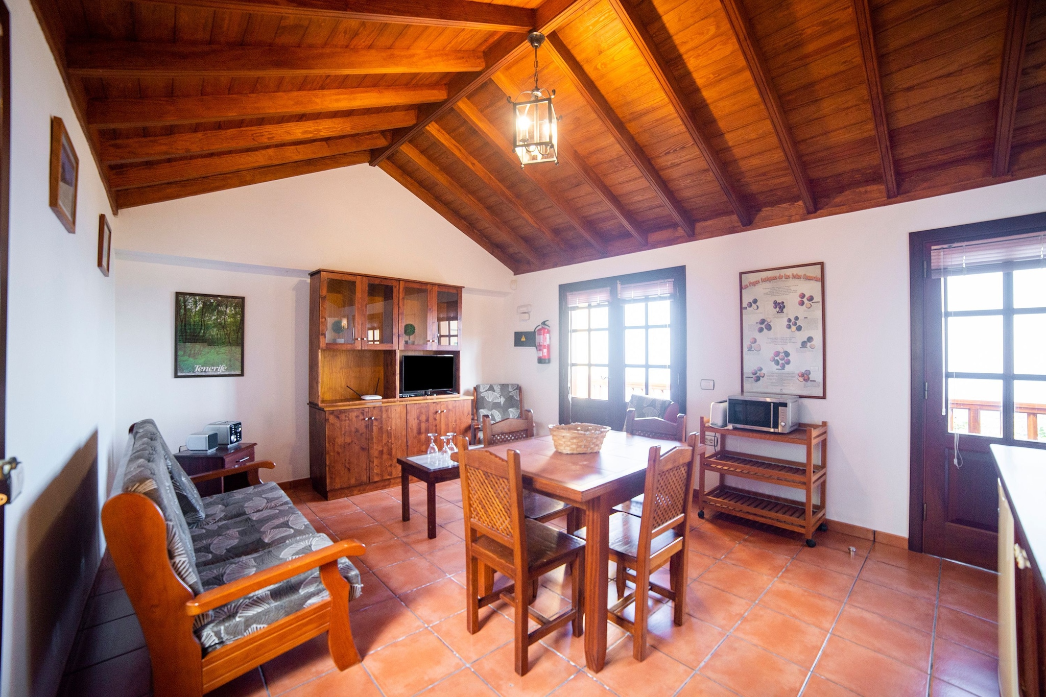 Ground floor: (open kitchen(cooker(4 ring stoves, gas), coffee machine, microwave, fridge), Living/diningroom(TV(satellite), dining table, seating area), bedroom(double bed(135 x 190 cm)), bedroom(single bed(90 x 190 cm)), bathroom(shower, washbasin, toilet))\n\nheating, terrace, garden furniture, sun loungers, parking, children\'s bed, high chair