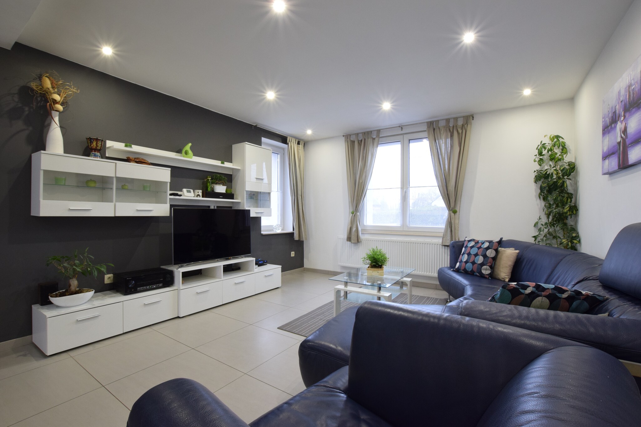 Ground floor: (Kitchen(electric kettle, cooker(gas), coffee machine(filter, pads), espresso machine, oven, microwave, dishwasher, fridge, freezer), Living/diningroom(TV(digital), dining table, fireplace, high chair), terrace)\n\nOn the 1st floor: (bedroom(double bed(160 x 200 cm)), bedroom(single bed(90 x 200 cm), double bed(180 x 200 cm)), bathroom(bathtub with shower, 2x washbasin, toilet))\n\nOn the 2nd floor: (bedroom(2x single bed(90 x 200 cm), double bed(160 x 200 cm)), bathroom(shower, washbasin, toilet, bidet))\n\nBasement: (bathroom(shower), relaxation area(tumble dryer, sauna, washing machine, table football, air hockey, billiards))\n\ncot, Bubble bath, heating(central), terrace, garden(partially fenced), garden furniture, BBQ, parking, slide, Swing set