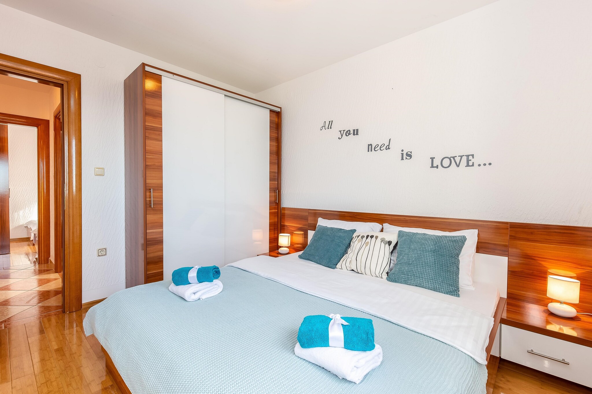 Ground floor: (Kitchen(dining table, electric kettle, cooker, coffee machine, oven, dishwasher, fridge-freezer), Living/bed room(double sofa bed, TV(flatscreen, satellite)), bedroom(double bed), bedroom(bunk bed), bathroom(shower, washbasin, toilet, washing machine, hairdryer), roof terrace)\n\nBubble bath, air conditioning, parking