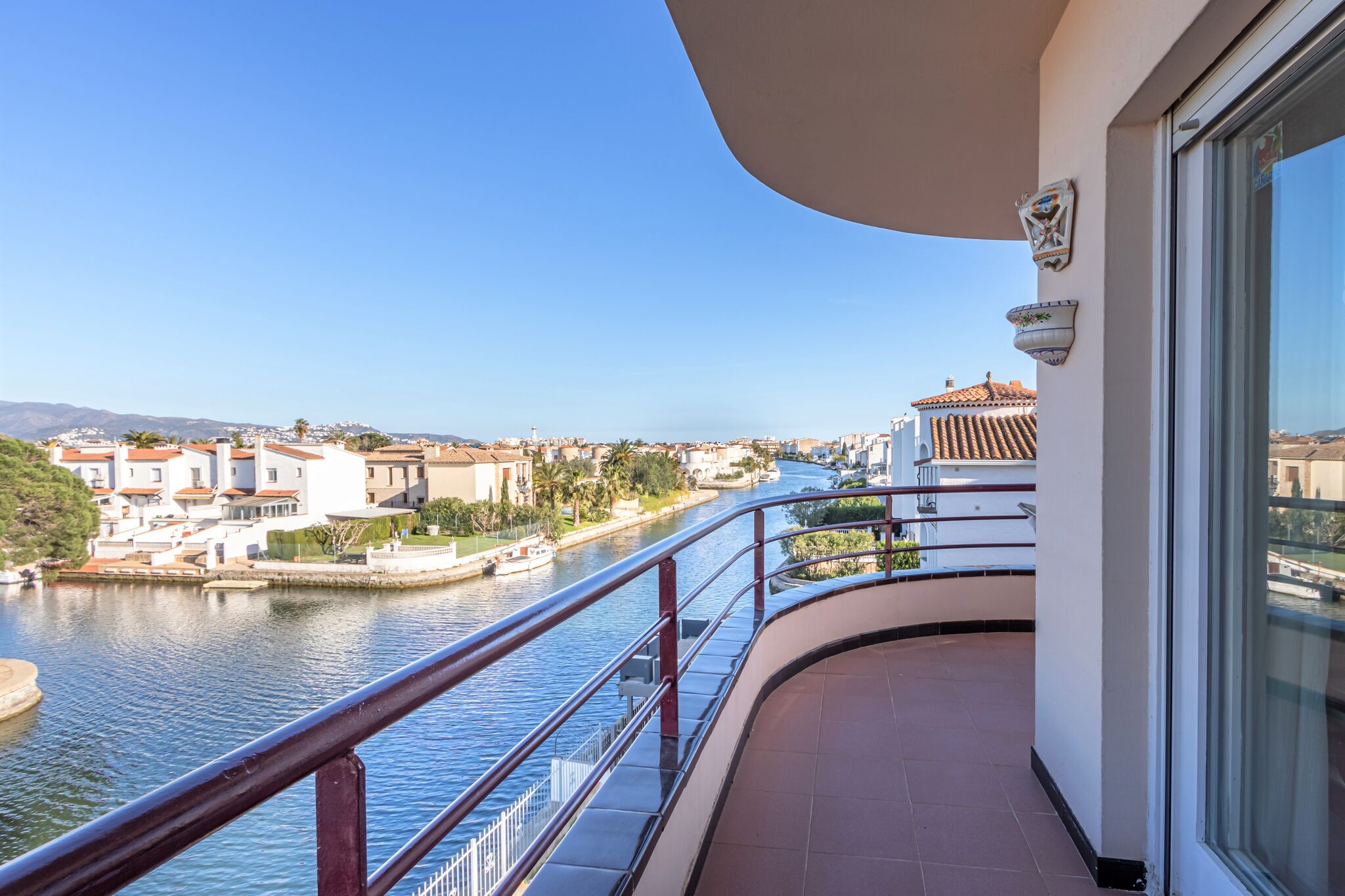 Waterfront Apartment with large terrace and parking space