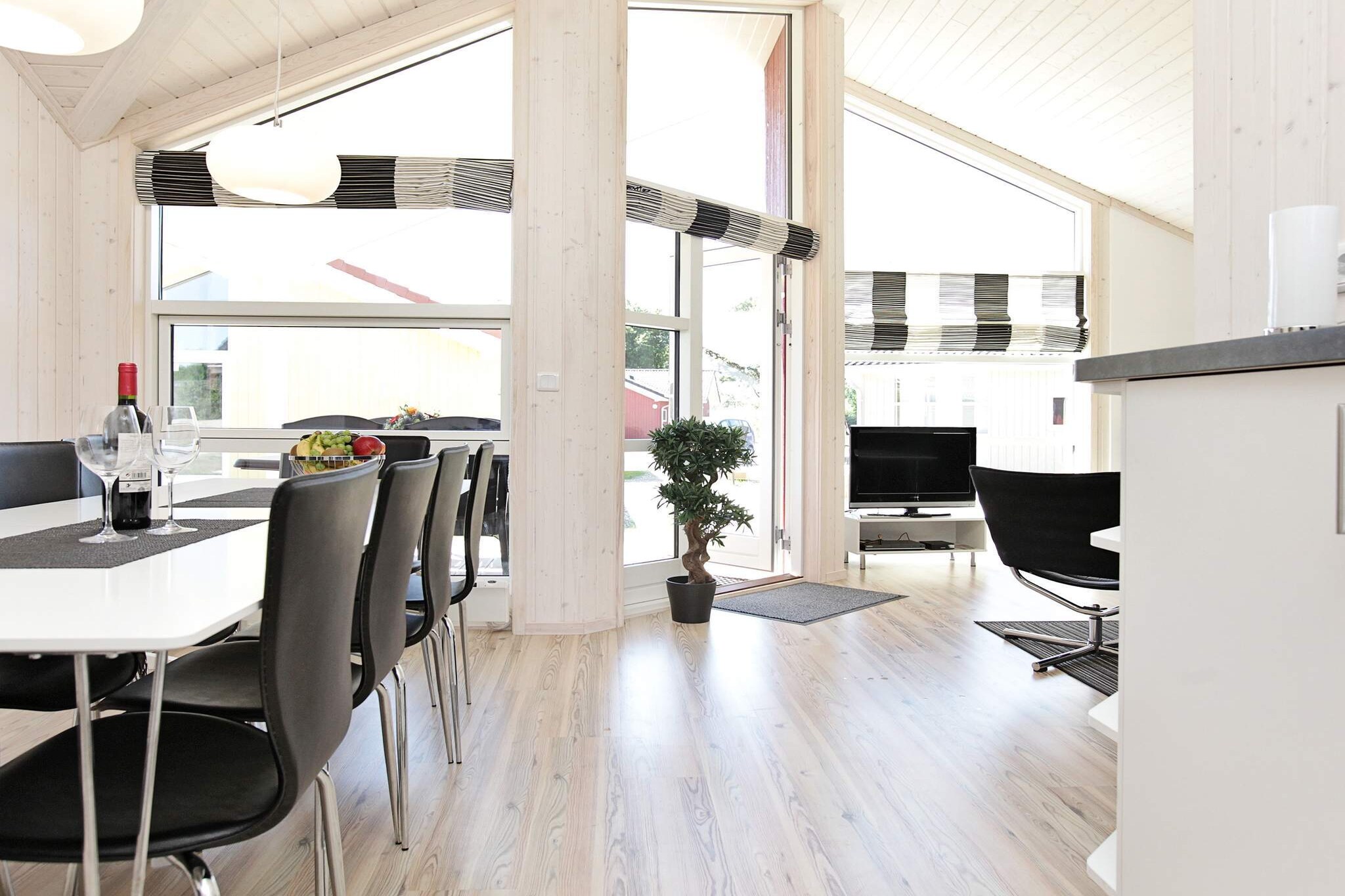 Sitting room(double bed), open kitchen(cooker(2 ring stoves), hood, coffee machine, oven, dishwasher, fridge-freezer), Living/bed room(38 m2)(TV(satellite, german television channels), DVD player, radio, CD player, stereo unit, high chair), bedroom(8 m2)(double bed, children\'s bed), bedroom(8 m2)(double bed), bedroom(7 m2)(2x single bed), bedroom(7 m2)(2x single bed), bathroom(floor heating)(tumble dryer, bathtub or shower, washbasin, toilet, washing machine), bathroom(floor heating)(bathtub or shower, washbasin, toilet), Bubble bath(indoor, heated), sauna(indoor, heated), heating(electric), terrace(roofed, 10 m2), terrace(5 m2)