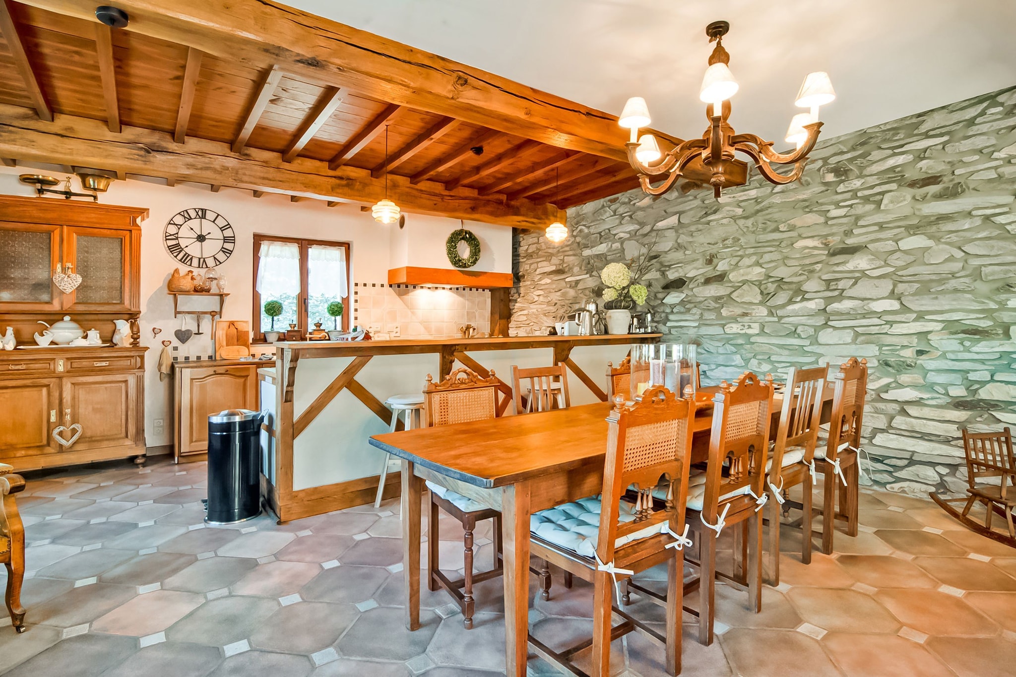 Ground floor: (hallway, Sitting room, open kitchen(4x hob(ceramic), coffee machine, oven, microwave, dishwasher, 2x fridge, high chair), Living/diningroom(stove(wood), table football), bathroom(bath tub, shower, washbasin, toilet), fridge, freezer)\n\nOn the 1st floor: (bedroom(single bed, single bed), bedroom(double bed), bedroom(double bed), bedroom(2x single bed), bathroom(shower, washbasin, toilet), cot, cot)\n\nTV, fireplace, streamingservice, dishwasher, bathtub or shower, washing machine, patio, heating(electric, central), terrace(65 m2), terrace(roofed), garden, garden furniture, BBQ, parking, deckchairs, parasol, children\'s bed, ironing board, iron, lounge set, party games