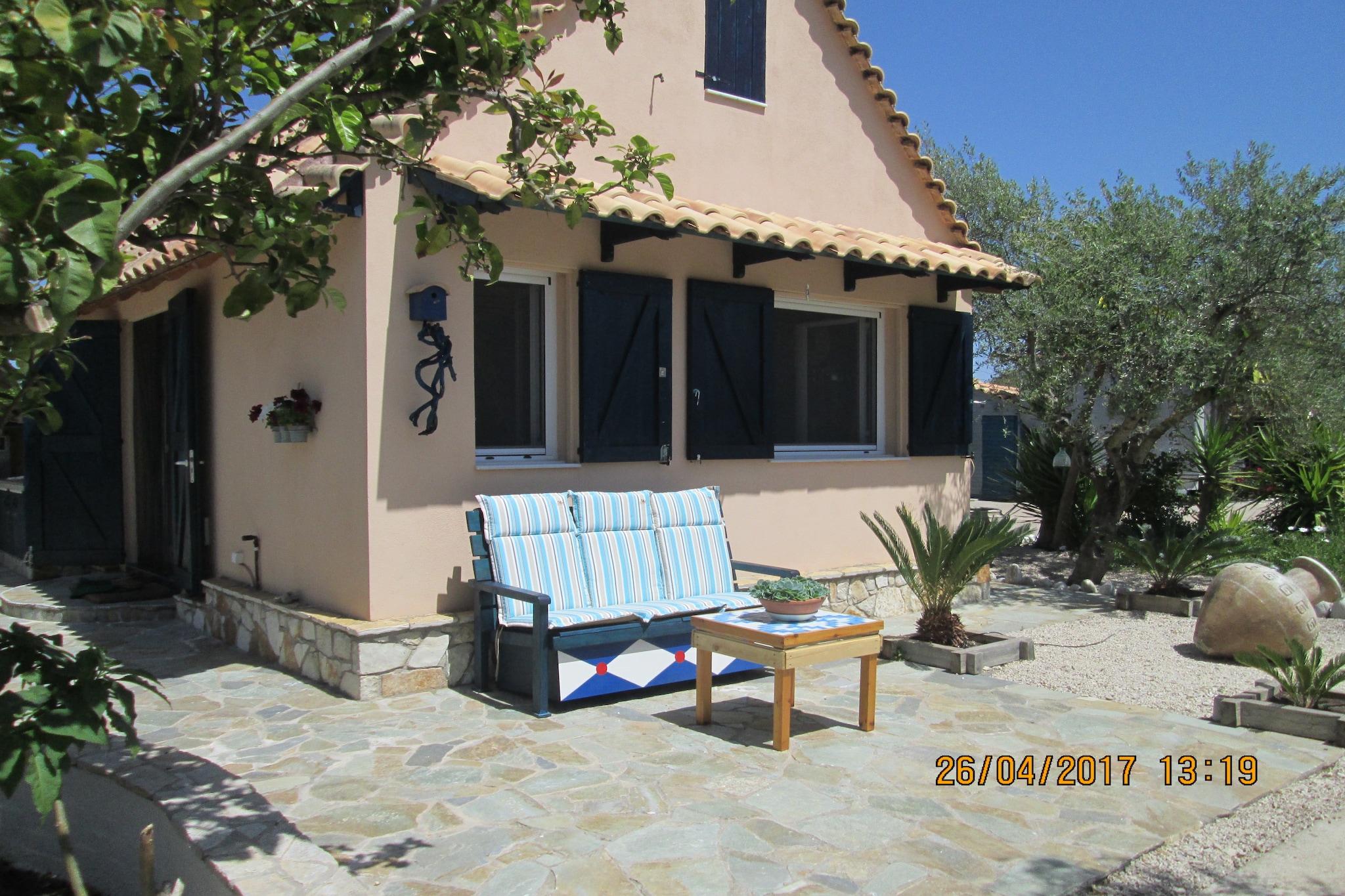 The attractive holiday home is located in Messinia, between the places Velika at 3 km and Petalidi at 5 km where all amenities are available. The holiday home is located directly on the sea, through the garden gate you walk on a narrow sand-pebble beach and you can swim in the quiet bay with beautiful views of the Taigetos Mountains on the Mani on the other side. At the garden gate is a terrace with table and chairs. This pebble beach extends all the way to Kalamata at 35 km. The view over the bay is phenomenal and the plot is 4000m2 with olive and fruit trees.
The house is suitable for 4 adults and 2 children up to 60 kg per child.
A simple campsite is located 80 meters away, where you can enjoy coffee, drinks and small snacks. 200 meters up the mountain is a restaurant called POULAKOS, there is also a bus stop here.
For hikers there is a walking booklet of this region available in Dutch, English and German.
There are beautiful old villages to visit and the people love it when tourists come.
A rental car is recommended to view this beautiful area. Old Messinia is a 45-minute drive away.
Flying from Amsterdam from April to the end of September directly on Kalamata is possible.
We are willing to pick up the guests at the airport of Kalamata.
About Belvilla
When you stay in a Belvilla home, you can rest assured of a unique holiday home in ideal surroundings at an attractive price. The portfolio of accommodations consists of more than 40,000-holiday homes in 20 European countries. Interested in a weekend getaway, a summer or winter sports holiday or simply a short break? Do you prefer the coast, the countryside or the mountains? Whatever your preference, there is a Belvilla home to meet your needs, from a cosy gîte for two to a castle big enough for the entire family, from an apartment in the heart of Rome to a cabin in the middle of nowhere, from a simple tree house to a luxury dream villa and from close to home to the other side of Europe.
A Belvilla home gives you the freedom to enjoy breakfast in your pyjamas or continue a good conversation into the morning hours without having to worry about the bar's closing time. Prepare gourmet meals with fresh local ingredients in your own kitchen and take advantage of having your own swimming pool to do as many cannonballs as you want! In other words, you can enjoy complete privacy in your home away from home.