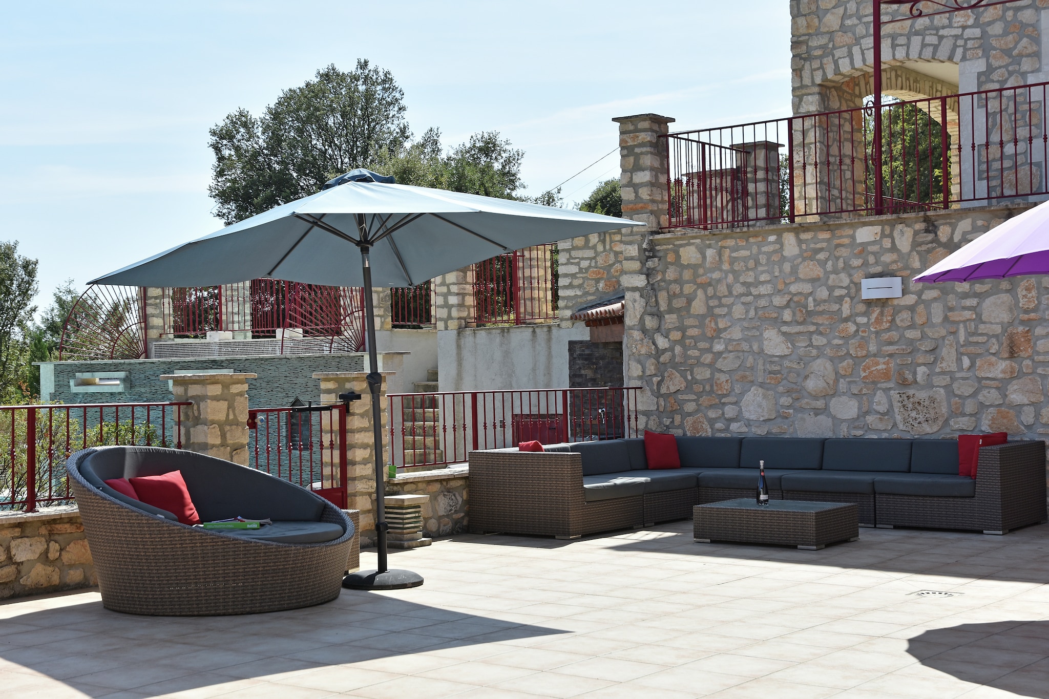 Ground floor: (sanitary facility(tumble dryer, washing machine), garage)\n\nOn the 1st floor: (Entrance, Kitchen(cooker(ceramic), coffee machine(filter), oven, microwave, dishwasher, fridge(american)), Living/diningroom(TV, fireplace, DVD player), terrace)\n\nOn the 2nd floor: (bedroom(2x single bed), bedroom(double bed), Bedroom with bathroom(double bed, bath tub, shower, 2x washbasin, toilet), bathroom(shower, 2x washbasin), toilet)\n\nOn the 3rd floor: (bedroom(bunk bed), bathroom(shower, washbasin), toilet)\n\ngarage, garden doors, terrace(private, 150 m2), garden(private, partially fenced, 800 m2), garden furniture, BBQ, parking, swimming pool(private, water alarm, including separate children’s swimming pool (depth 50cm), 14 x 4 m., opened from May upto and including Oct), children\'s bed, high chair