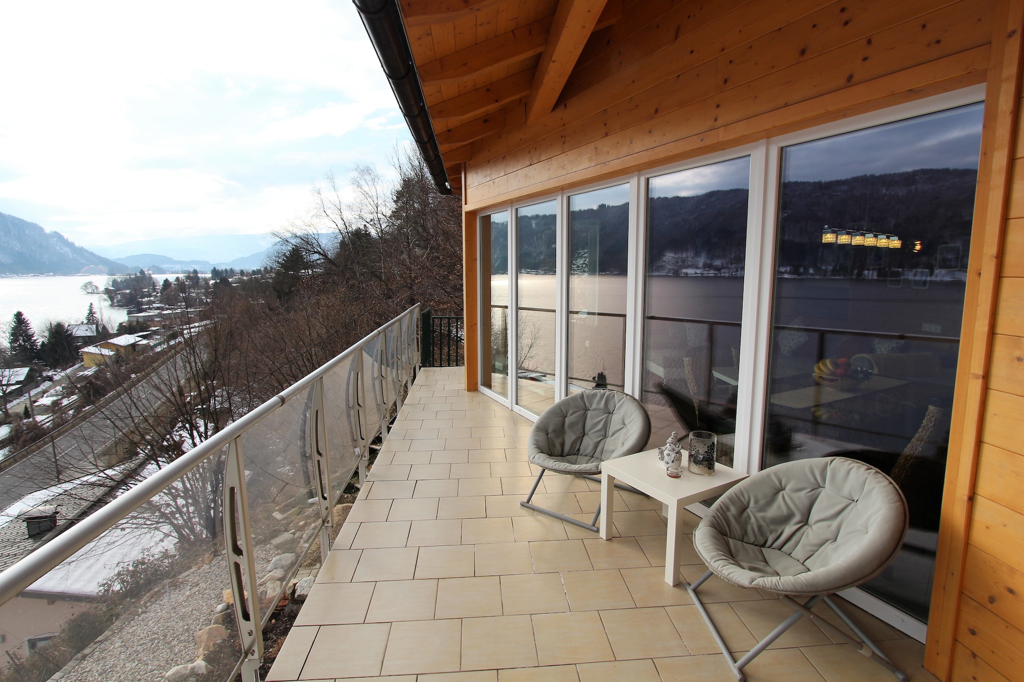 Ground floor: (ski storage, parking)\n\nOn the 1st floor: (hallway, Living room(TV(flatscreen), dining table, seating area, balcony), open kitchen(electric kettle, cooker(4 ring stoves, ceramic), coffee machine, oven, dishwasher, fridge-freezer), bedroom(double bed, balcony), bedroom(double bed), bathroom(shower, washbasin, toilet, washing machine), garden doors)\n\ngarden, BBQ