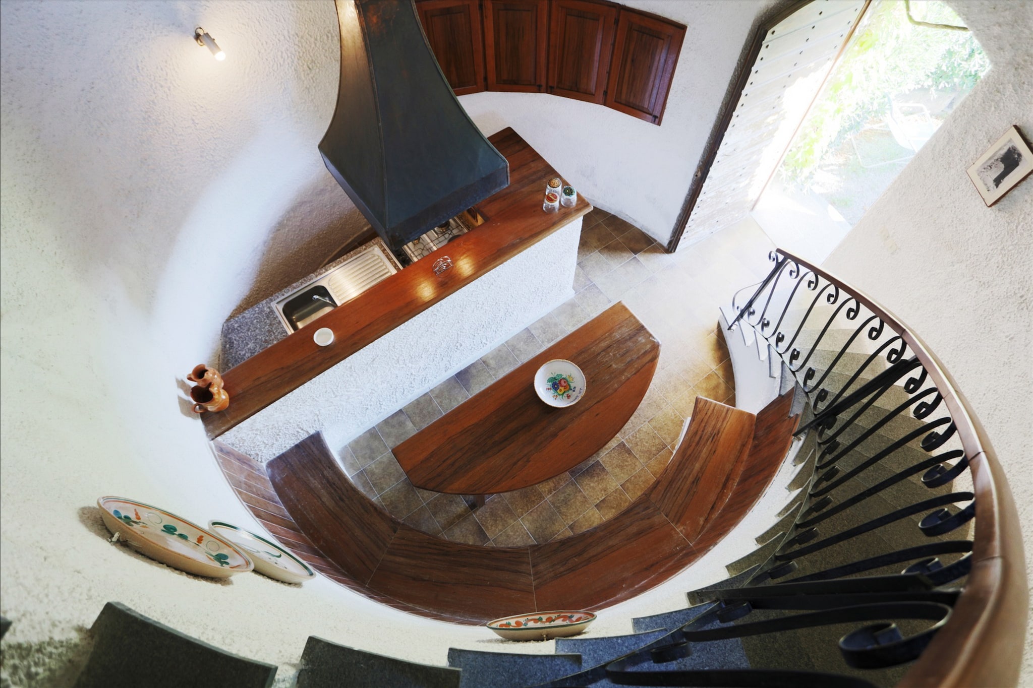 This two-floor apartment offers an exceptional coastal escape in Santa Caterina dello Ionio. Access your stay through a private garden, ideal for delightful outdoor meals. From the first-floor balcony, a breathtaking view of the sparkling beach and sea unfolds. The complex boasts a fantastic private sandy beach with clear blue waters, directly bordering a communal wooded garden. While lacking formal entertainment, guests can enjoy a variety of activities, including bowling, table tennis, and relaxing in hammocks overlooking the beach. A large kitchen, garden furniture, barbecue, parking, a tennis court, and a boules court are also available.
Directly bordering your retreat, a private sandy beach invites immediate seaside enjoyment just 10 meters away. Beyond the pristine coast, the surrounding area offers a wealth of excursions. Explore historical marvels like the Florense Abbey in San Giovanni in Fiore, the ancient Basilica of San Giovanni Theristis in Bivongi, the serene Certosa in Serra San Bruno, and the historic Catholic Church in Stilo. Nature lovers can visit the Giants of Silla natural park, while art enthusiasts will appreciate the open-air modern art at Mu.Sa.Ba.
Local restaurants offer authentic Calabrian flavours, promising a true taste of the region. For those eager to deepen their gastronomic journey, the owner can provide updates on various cultural and gastronomic trips available nearby, including opportunities for a Calabrian cooking class, allowing you to immerse yourself fully in the local culinary traditions.