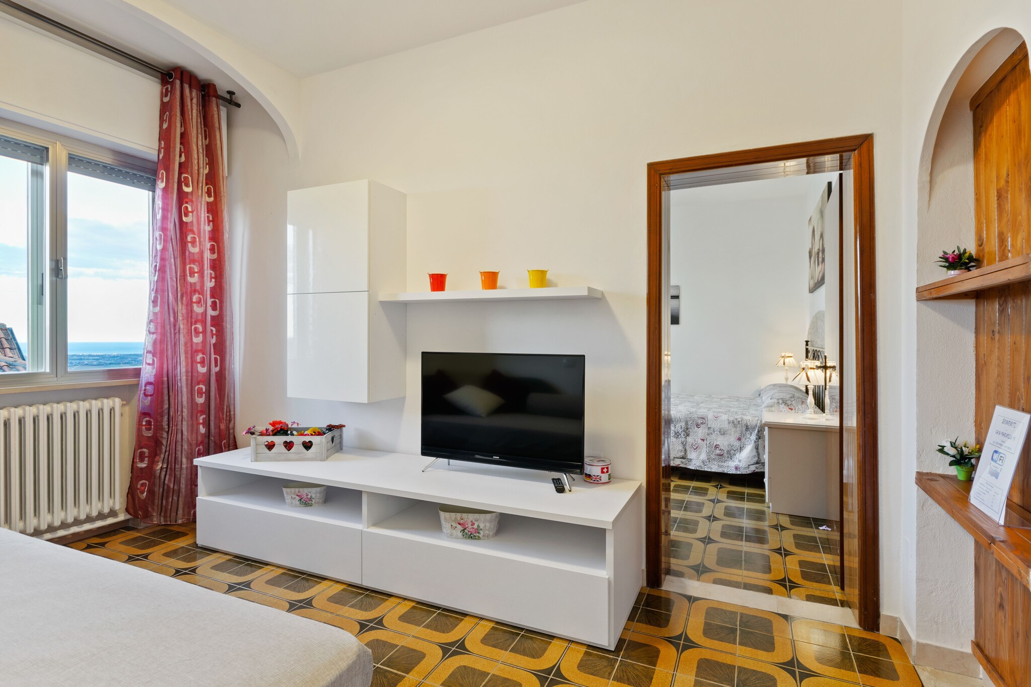Located in Saludecio, this modern 1-bedroom apartment is ideal for a small group or a couple on a romantic getaway. There is also a shared courtyard and a shared terrace to relax and unwind.
The famous Misano World Circuit Marco Simoncelli (10 km) is in the vicinity of the apartment. An excursion can also be planned to the aquarium of Acquario Cattolica (12 km), and to the picturesque town of Cattolica (16 km). You can even indulge in shopping at Viale Ceccarini Riccione (15 km), or enjoy a lazy, sunny day at the beach at Riccione (21 km).
This well-furnished apartment has a modular kitchen, equipped with a cooker, n espresso machine and an oven. You can even unwind at the terrace decked with garden furniture and parasol. The host even allows a maximum of 1 pet at the property.
The nearest airport is Federico Fellini Int'l Airport, which is 26 km away from the apartment.