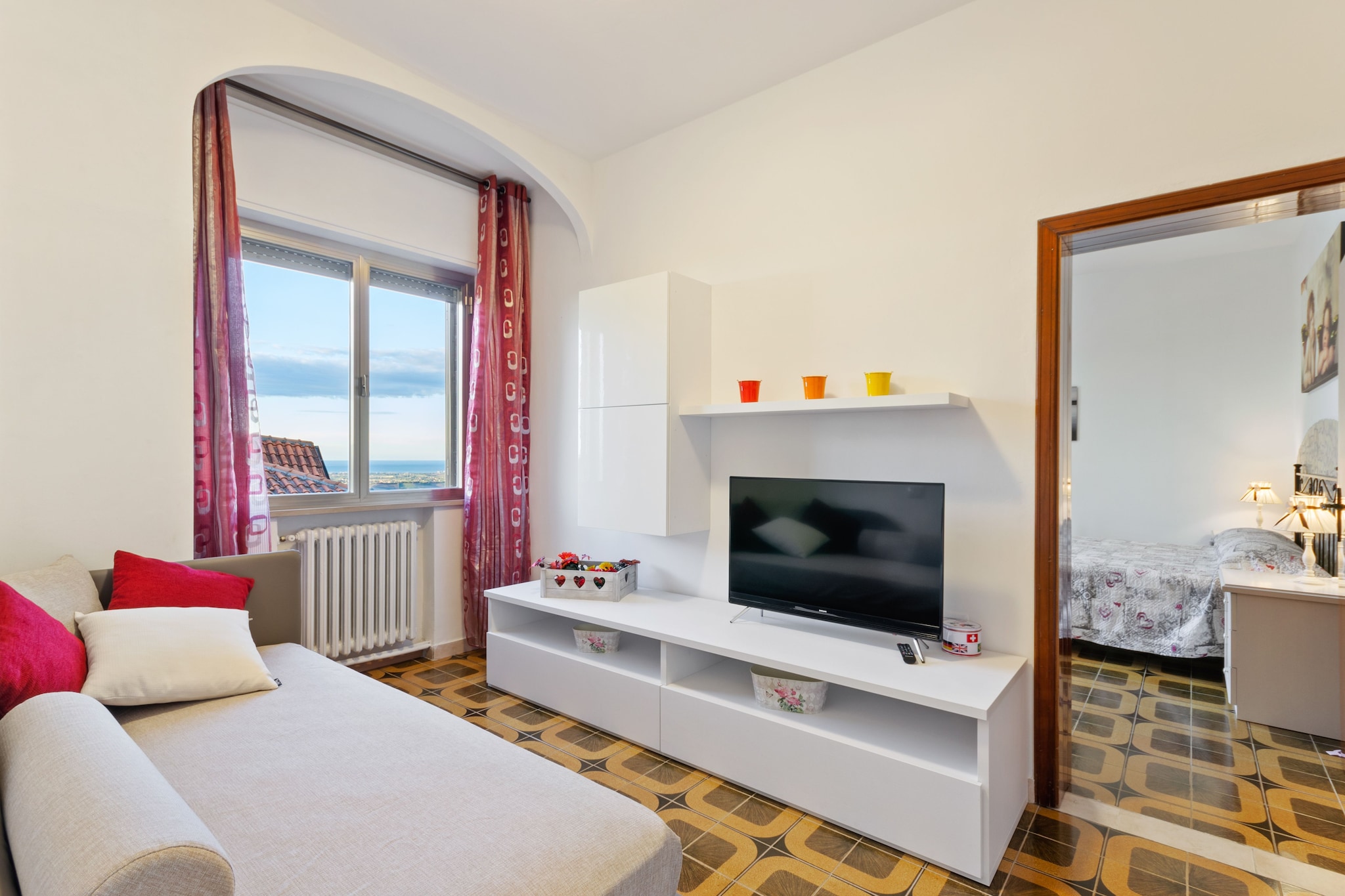 Ground floor: (courtyard(shared with other guests), terrace(shared with other guests), garden furniture, parasol)\n\nOn the 1st floor: (Kitchen(TV, cooker(4 ring stoves, gas), espresso machine, oven, microwave, fridge-freezer), Living/bed room(single sofa bed, TV), bedroom(double bed, balcony), bathroom(shower, washbasin, toilet, bidet, washing machine), hall)\n\nironing board, iron