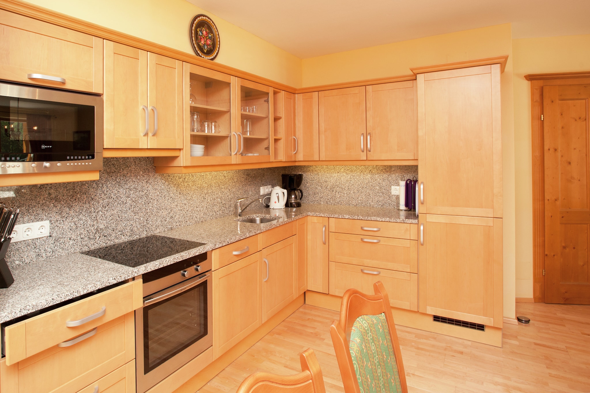 Entrance, Living room(double sofa bed, TV(cable, flatscreen), seating area), open kitchen(electric kettle, cooker(4 ring stoves, ceramic), coffee machine(filter), oven, microwave, dishwasher, fridge-freezer), bedroom(double bed), bedroom(double bed), bedroom(2x bunk bed), bathroom(bath tub, shower, washbasin, toilet), bathroom(shower, sauna), toilet, ski storage(shared with other guests)(ski boot heaters), garage, garage, washing machine, balcony or terrace, heating(central, floor heating), parking, Charging post for electric cars, Charging post for electric cars