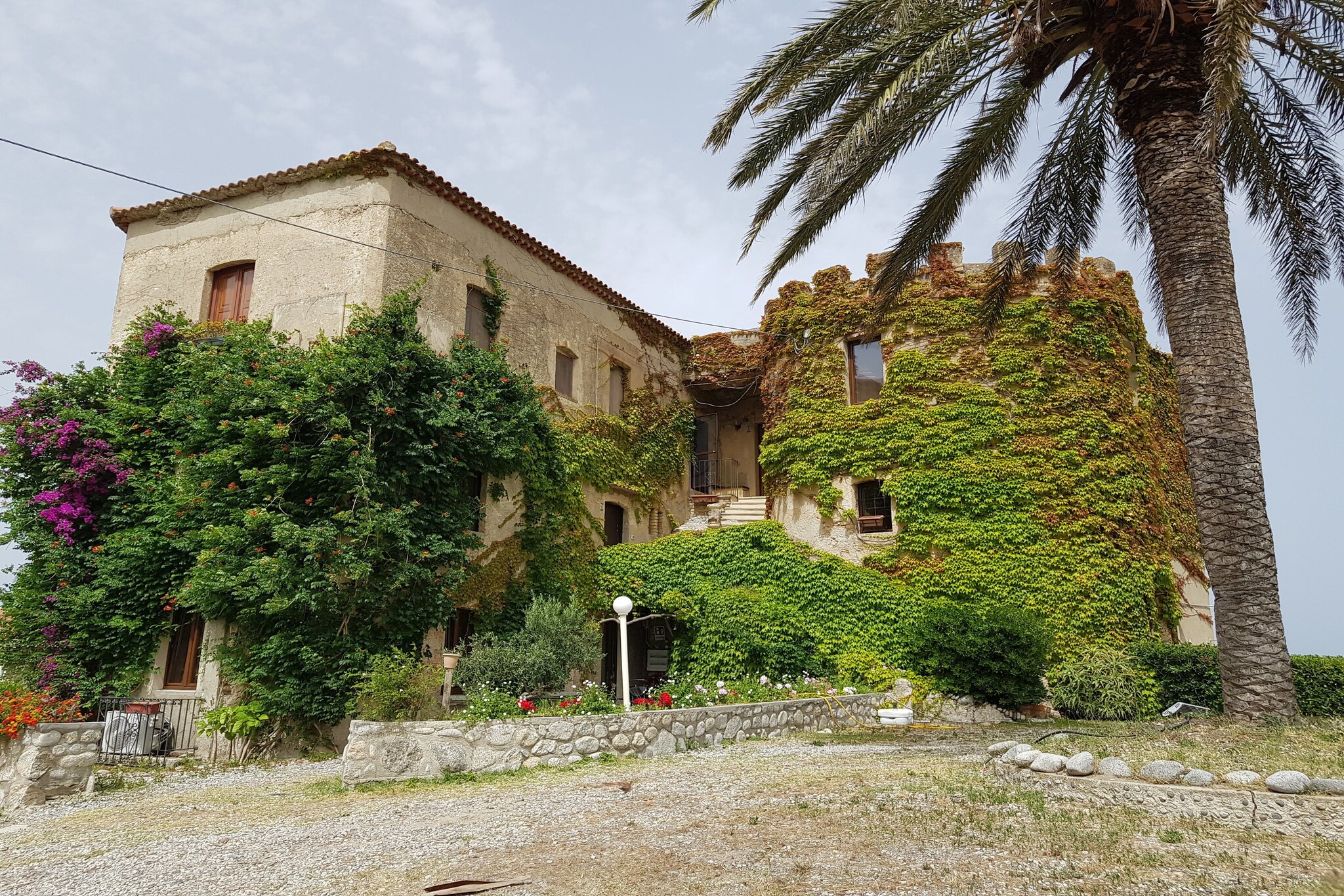 Seaside Charm with a Garden & Private Beach Access
Wake up to sweeping views of the Ionian Sea from your private garden at this beautifully renovated holiday home in Santa Caterina dello Ionio. With cozy indoor-outdoor living, a fully equipped kitchen, and inviting spaces like a BBQ area, boules court, and hammocks overlooking the sea, this is where relaxation meets authenticity. The apartment spans two floors, blending comfort and style with thoughtful design. Enjoy morning coffee on the terrace or a starlit evening on the balconyâ€”both with a salty breeze and endless serenity.

Explore Calabriaâ€™s Hidden Cultural Gems
Set just 10 meters from a sandy beach and a short stroll to the village center, you're perfectly placed for both rest and discovery. Venture to the medieval charm of Badolato Borgo or explore the serene Certosa di Serra San Bruno monastery. Hike through the Giants of Sila natural park or ride horseback along the coastline. The nearby Mu.Sa.Ba open-air art museum and ancient churches in Stilo offer a perfect dose of history and creativity, all within reach.

Dine & Discoverâ€”Pet-Friendly Paradise
Sample authentic Calabrian flavors at trattorias in Santa Caterina, just 600 meters away, or join a local cooking class to master regional recipes. Bring your furry friendâ€”pets are welcome and will love beach walks at dawn, hikes through shaded forest trails, and relaxing under parasols in your garden. From delicious cuisine to pet-inclusive adventures, this is your perfect coastal escape.