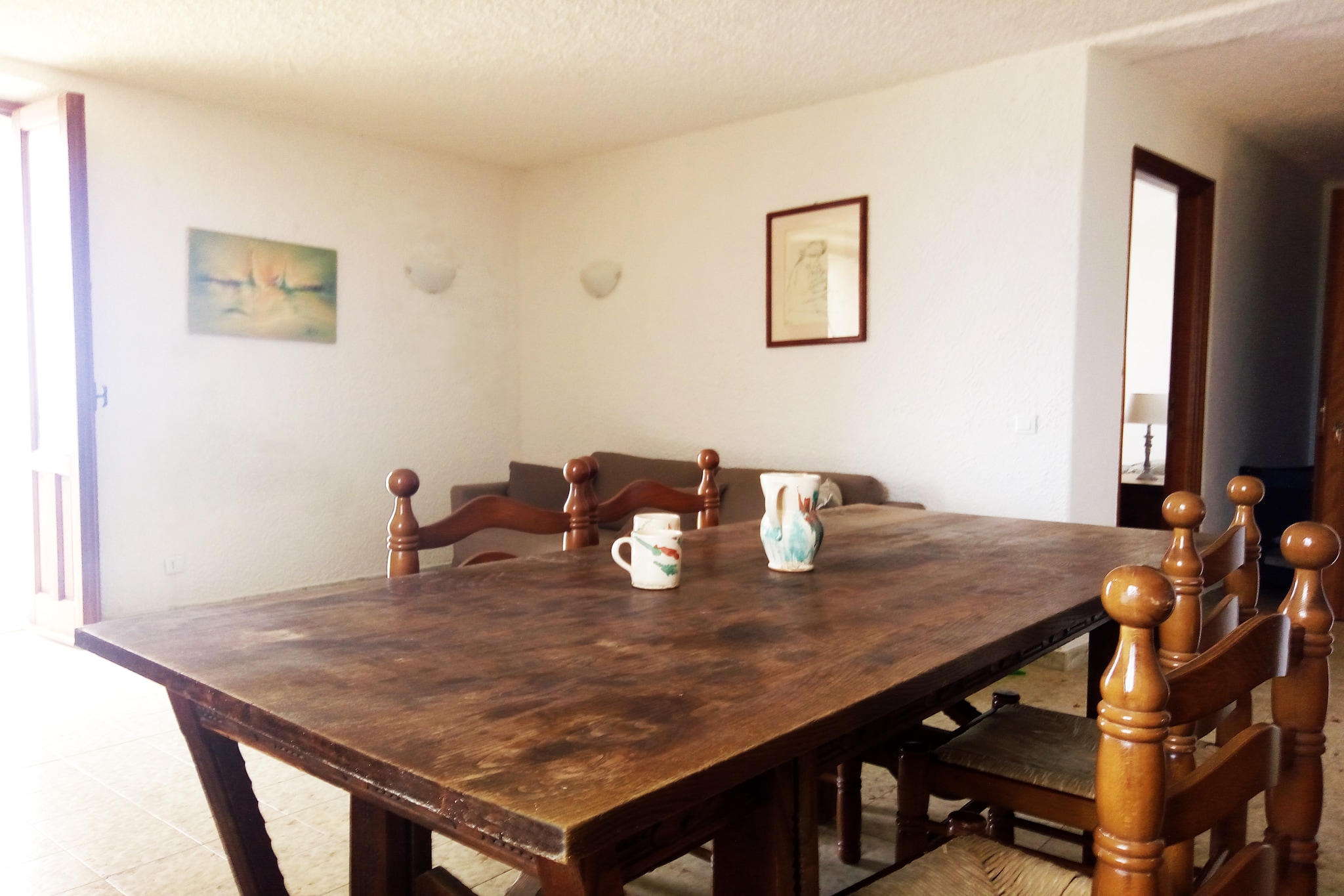 This freshly renovated first-floor villa apartment offers the perfect balance of spacious comfort and seaside charm. With two sea-view balconies and a private garden, you can enjoy golden sunrises over the Ionian Sea and peaceful evenings surrounded by Mediterranean greenery. Whether you're sipping espresso on the terrace or relaxing in a hammock by the beach, this serene setting is designed for total rejuvenation. The villa is part of a tranquil, low-density complex with direct access to a private sandy beach.

Located just 10 meters from the sea and a short walk to the heart of Santa Caterina dello Ionio, the villa is a gateway to Calabriaâ€™s most captivating sights. Explore historic villages like Badolato Borgo and the picturesque streets of Soverato, or take scenic drives to cultural treasures like the Certosa in Serra San Bruno and the ancient churches of Stilo. Nature lovers can venture to the I Giganti della Sila for forest hikes and panoramic views, or enjoy horseback riding right on the beach.

Dine just 600 meters away at cozy trattorias serving traditional Calabrian dishes like â€˜nduja, handmade pasta, and fresh seafood. Pets are welcome tooâ€”take your furry companion on coastal walks, forest trails, or let them play freely in your private garden. Santa Caterina is known for its warm hospitality, authentic cuisine, and open-air charm, making it the perfect spot for travelers (and pets!) seeking a laid-back escape.