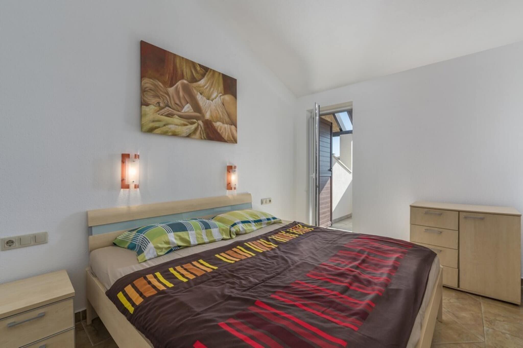 Ground floor: (Living room(double sofa bed, TV(cable, flatscreen, satellite)), Kitchen(dining table, electric kettle, toaster, cooker(4 ring stoves), coffee machine(filter), oven, microwave, dishwasher, fridge-freezer), bathroom(shower, washbasin, toilet))\n\nOn the 1st floor: (bedroom(accessible via interconnecting room)(single bed), Bedroom with bathroom(double bed, bathtub with shower, washbasin, toilet, balcony), Bedroom with bathroom(double bed, bathtub with shower, washbasin, toilet))\n\ncourtyard, garden furniture, sun loungers, BBQ, parking, parasol, swimming pool(private)