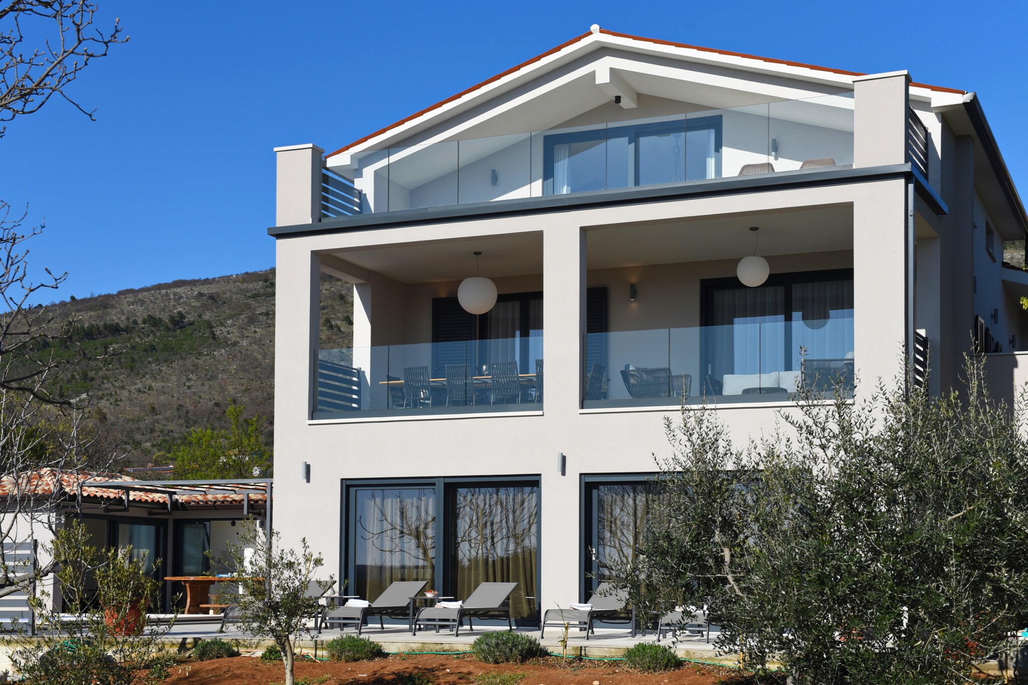 In the ViÅ¡kovici region of Istria in Croatia, this villa can accommodate 9 guests and has 5 lovely bedrooms. It is well suited for a big family or group of friends that want to go on a holiday together.

About Belvilla

When you stay in a Belvilla home, you can rest assured of a unique holiday home in ideal surroundings at an attractive price. The portfolio of accommodations consists of more than 40,000-holiday homes in 20 European countries. Interested in a weekend getaway, a summer or winter sports holiday or simply a short break? Do you prefer the coast, the countryside or the mountains? Whatever your preference, there is a Belvilla home to meet your needs, from a cosy gÃ®te for two to a castle big enough for the entire family, from an apartment in the heart of Rome to a cabin in the middle of nowhere, from a simple tree house to a luxury dream villa and from close to home to the other side of Europe.

A Belvilla home gives you the freedom to enjoy breakfast in your pyjamas or continue a good conversation into the morning hours without having to worry about the bar's closing time. Prepare gourmet meals with fresh local ingredients in your own kitchen and take advantage of having your own swimming pool to do as many cannonballs as you want! In other words, you can enjoy complete privacy in your home away from home.