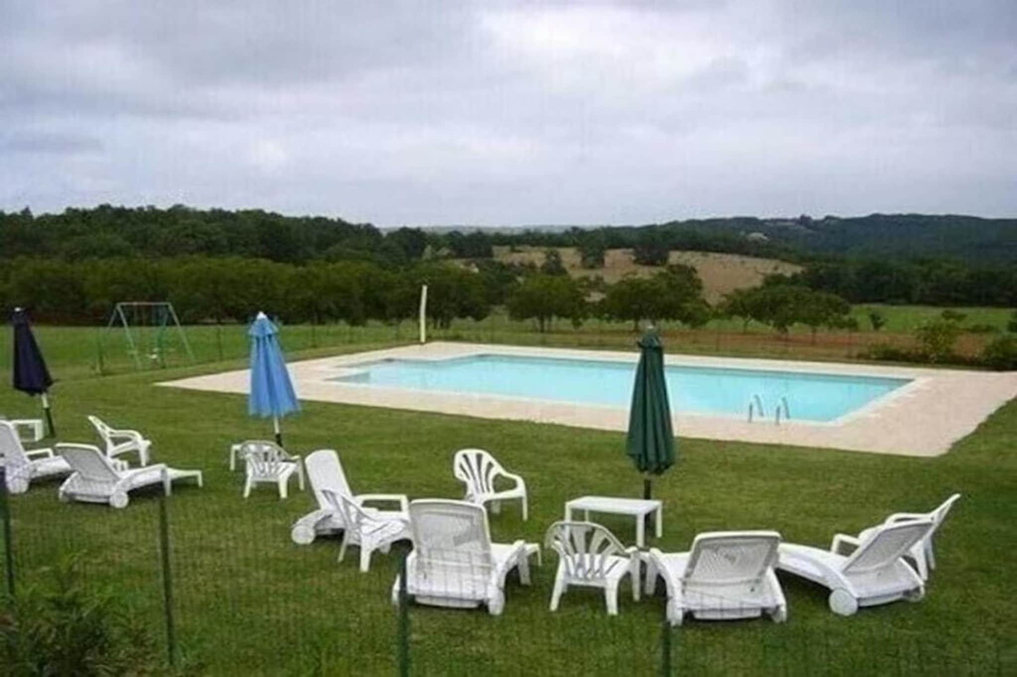 This spacious countryside holiday cottage nestled in Salviac, located near Sarlat in the Dordogne, is set on a former agricultural estate of over 20 hectares, offering open views, privacy, and a peaceful rural atmosphere. Designed for families and groups, the house comfortably accommodates up to 8 guests across 4 bedrooms, making it ideal for relaxed stays surrounded by nature.

On the ground floor, the home features a large dining and living area with a sofa and TV, creating a welcoming space for shared meals and evenings together, and a fully equipped kitchen. High-speed Wi-Fi is available throughout, and there is also a convenient separate WC on this level. The first floor offers four bedrooms, including three rooms with double beds and one room with twin beds. Two modern shower rooms, each with its own WC, serve the sleeping area. There is also the possibility of adding two baby beds for families travelling with young children.

Outdoors, this pet friendly home features a spacious private garden with garden furniture, a parasol, and a barbecue, plus a terrace and balcony overlooking the countryside. The standout feature is the large private fenced swimming pool with sun loungers and parasols, complemented by a children’s play area, swing, open green spaces, and private parking.

Located near Salviac and close to Sarlat-la-Canéda, guests enjoy easy access to the Dordogne’s top attractions, from medieval towns and castles to caves and local markets. Activities include canoeing on the Dordogne River, visiting Lascaux, cycling scenic routes, wine tasting, and enjoying regional cuisine, with beautiful valleys and forests ideal for hiking and family outings.
