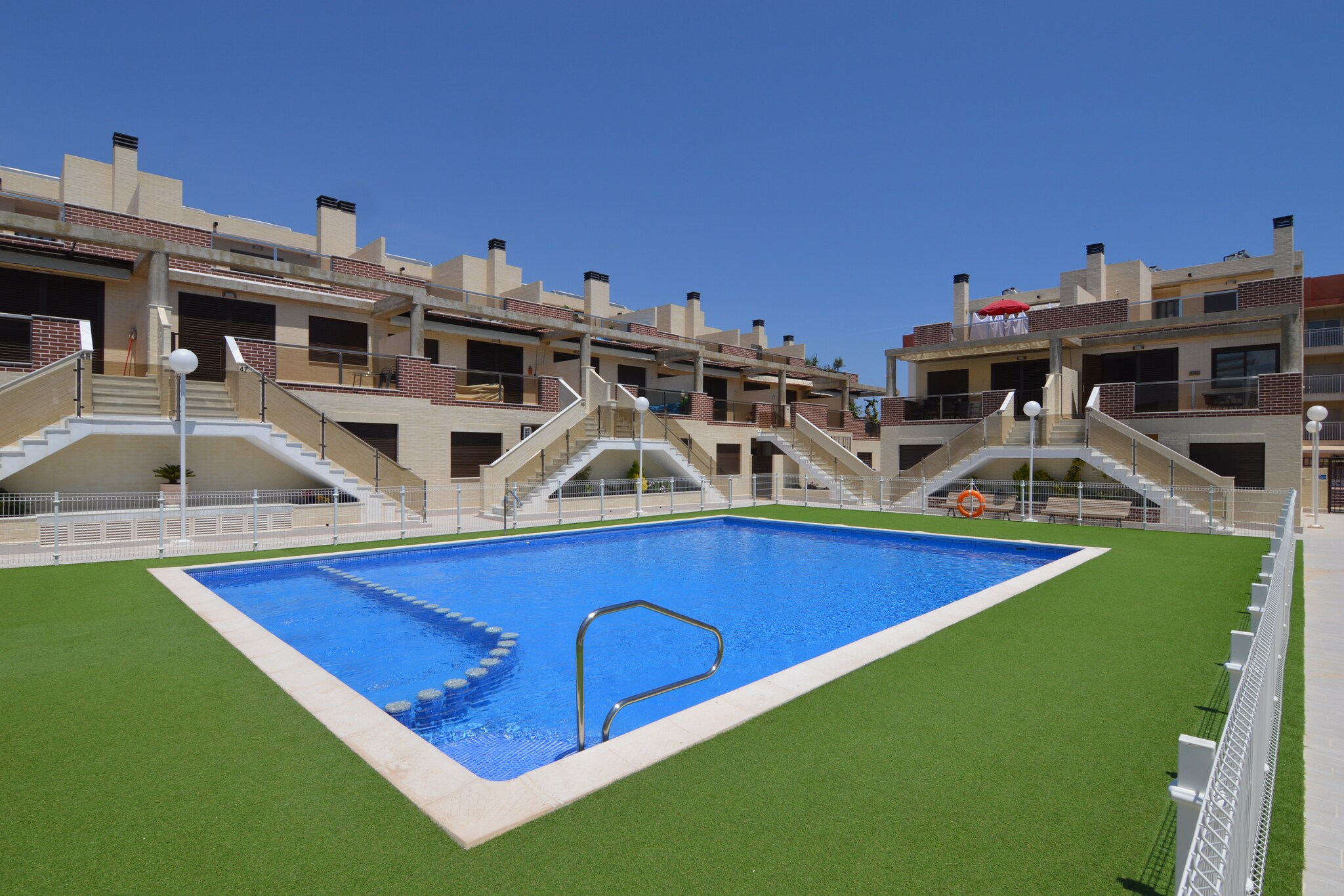 Enjoy a relaxing Mediterranean escape in this cozy 3-bedroom apartment in Valencia, perfect for families or small groups of up to 6 guests. Located just 3.9 km from Playa Cabo Roig and 4.5 km from Torrevieja town center, this home offers a peaceful base with easy access to the coast and local attractions.

The apartment features a private terrace with garden furniture, ideal for morning coffee or evening chats. Inside, you'll find a comfortable living space with air conditioning and a well-equipped kitchen for preparing meals. After a day of exploring, cool off in the shared swimming pool or unwind in the comfort of your home.

With restaurants just 300 meters away and supermarkets within 2.8 km, everything you need is close by. Alicante Airport is 53 km away, and guests have a designated parking spot in the garage for added convenience.

Whether you're here for beach days, city strolls, or simply to relax, this apartment offers a welcoming retreat on the Costa Blanca.