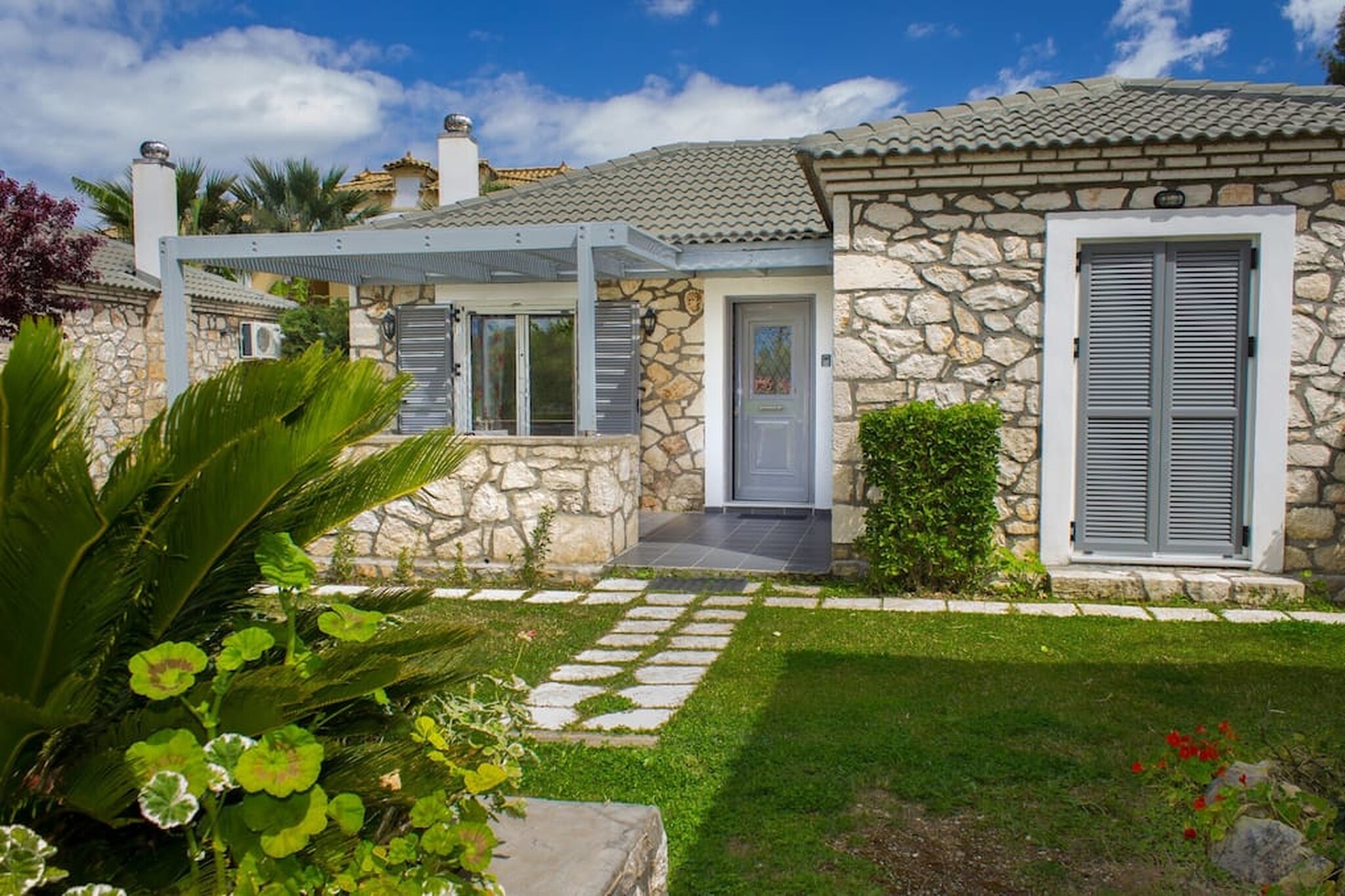 A lovely villa in the Agrilia region of Zakynthos in Greece, it can house up to 6 guests and has 2 bedrooms. It is perfect for a family or group of friends looking to have a wonderful vacation in this region of Crete.

About Belvilla

When you stay in a Belvilla home, you can rest assured of a unique holiday home in ideal surroundings at an attractive price. The portfolio of accommodations consists of more than 40,000-holiday homes in 20 European countries. Interested in a weekend getaway, a summer or winter sports holiday or simply a short break? Do you prefer the coast, the countryside or the mountains? Whatever your preference, there is a Belvilla home to meet your needs, from a cosy gîte for two to a castle big enough for the entire family, from an apartment in the heart of Rome to a cabin in the middle of nowhere, from a simple tree house to a luxury dream villa and from close to home to the other side of Europe.

A Belvilla home gives you the freedom to enjoy breakfast in your pyjamas or continue a good conversation into the morning hours without having to worry about the bar's closing time. Prepare gourmet meals with fresh local ingredients in your own kitchen and take advantage of having your own swimming pool to do as many cannonballs as you want! In other words, you can enjoy complete privacy in your home away from home.