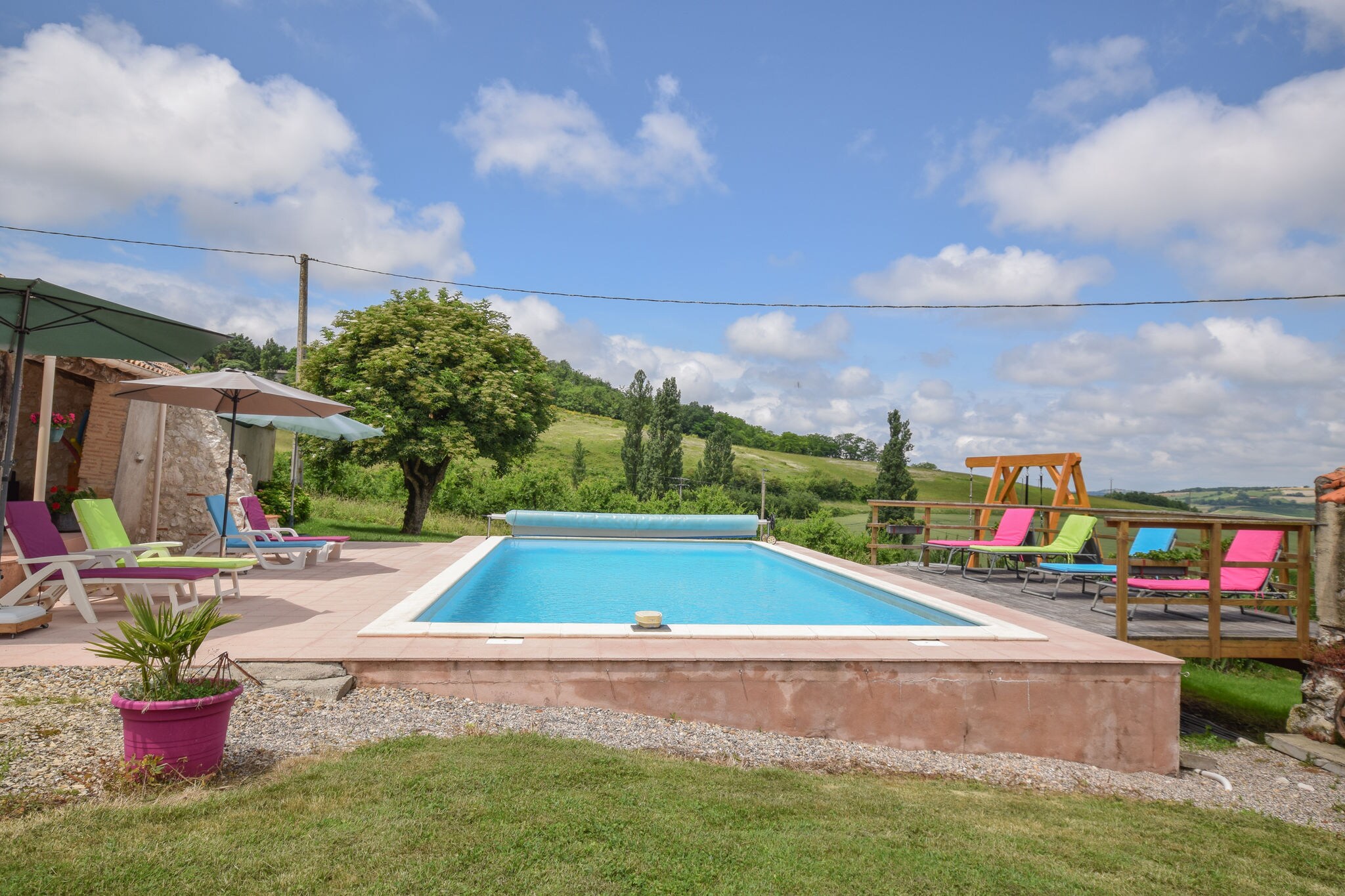 Spacious villa with large terraces and private pool, set in rural surroundings.
