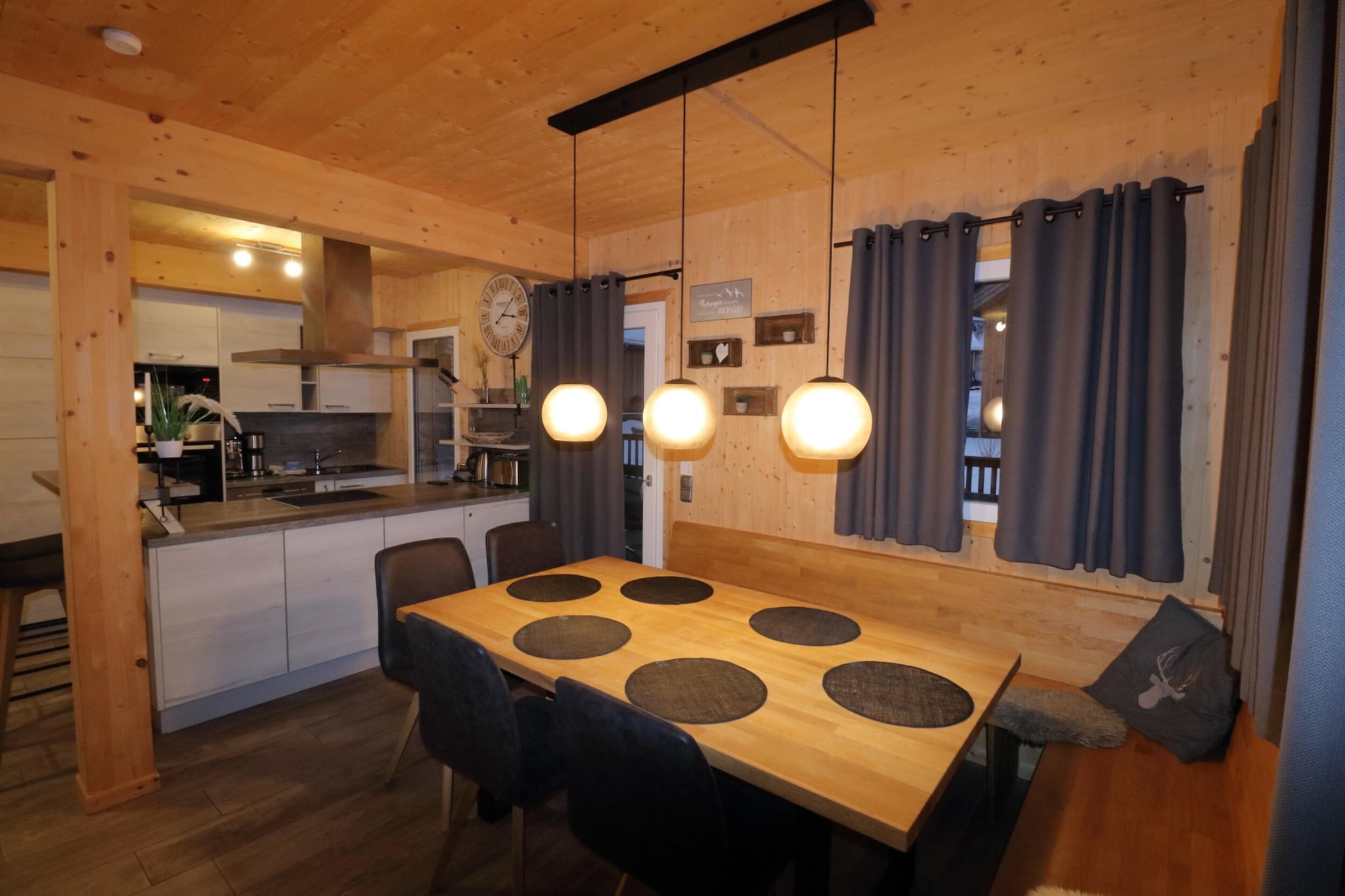 "Welcome to our spacious and luxurious chalet, offering 130 m² of elegantly designed living space to accommodate up to 9 guests. Perfectly situated directly in the ski area at Kreischberg Valley Station, this exclusive retreat combines modern comforts with an unbeatable location for a memorable alpine experience. The chalet features three beautifully appointed bedrooms, each with a double bed, and an additional bedroom with a bunk bed and a single bed, ensuring ample space for all guests. The two well-equipped bathrooms offer a choice between a shower or an indoor whirlpool tub, and a hairdryer is provided for your convenience.
Located directly on the ski area at Kreischberg, the chalet provides easy access to world-class skiing, charming local shops, and stunning alpine scenery, making it the perfect choice for an exceptional alpine getaway.
The heart of the chalet is its expansive living-dining area, designed for both relaxation and entertainment. Enjoy a cozy seating arrangement and a flat-screen TV for your leisure. The open-plan kitchen is fully equipped with all the essentials, including cutlery, cookware, a ceramic hob, oven, dishwasher, and a fridge with a freezer compartment. Additional amenities such as a toaster, kettle, and coffee machine are also provided. A small starter kit with essential cleaning supplies and dishwashing items will be ready upon your arrival to ensure a smooth start to your stay. Indulge in the luxury of your private whirlpool and relax in the sauna after a day of skiing or exploring. The chalet also features an e-charging station for electric vehicles, adding convenience and sustainability to your stay. Complimentary Wi-Fi and satellite TV are available to keep you connected and entertained throughout your visit.
As a special benefit, your stay includes the Murau-Murtal GuestCard for summer activities, offering additional perks and discounts on local attractions. "