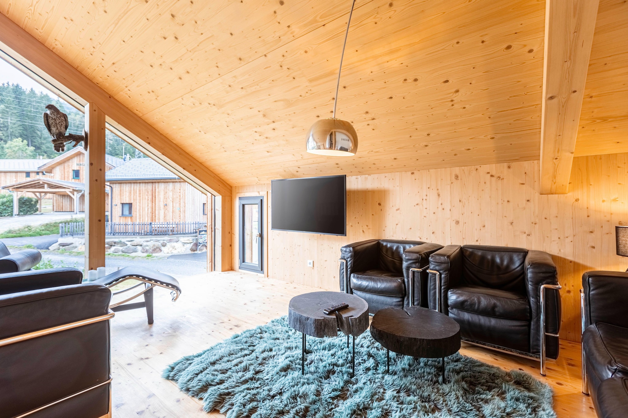 "Discover luxury and comfort in this exquisite chalet, ideally located at the Kreischberg Valley Station. Spanning 115 mÂ², this deluxe holiday home accommodates up to 9 guests, offering ample space for family gatherings or group getaways. The chalet features four inviting bedrooms: three with double beds and one with a single bed and bunk beds, ensuring a restful retreat for everyone. With two modern bathrooms, each equipped with a shower and a hairdryer, you can start your day refreshed and ready for adventure. 

 Located in a prime spot at the Kreischberg Valley Station, you have direct access to top-notch skiing and snowboarding facilities in winter, and scenic hiking and biking trails in the summer. Additionally, your stay includes the Murau-Murtal GuestCard (summer), offering a range of benefits and discounts to enhance your experience. 

Unwind in the spacious living-dining area, perfect for relaxation and socializing. The cozy seating and flat-screen TV create an ideal spot to relax after exploring. The open kitchen is fully equipped with cutlery, cookware, a ceramic hob, oven, dishwasher, and fridge, plus a toaster, kettle, and coffee machine. A starter set of cleaning supplies will be ready upon your arrival. Enjoy the luxurious whirlpool and infrared sauna for ultimate relaxation. Stay connected with free Wi-Fi and satellite TV.

A unique feature of this chalet is the e-charging station, perfect for guests traveling with electric vehicles, providing an eco-friendly and convenient solution during your stay."