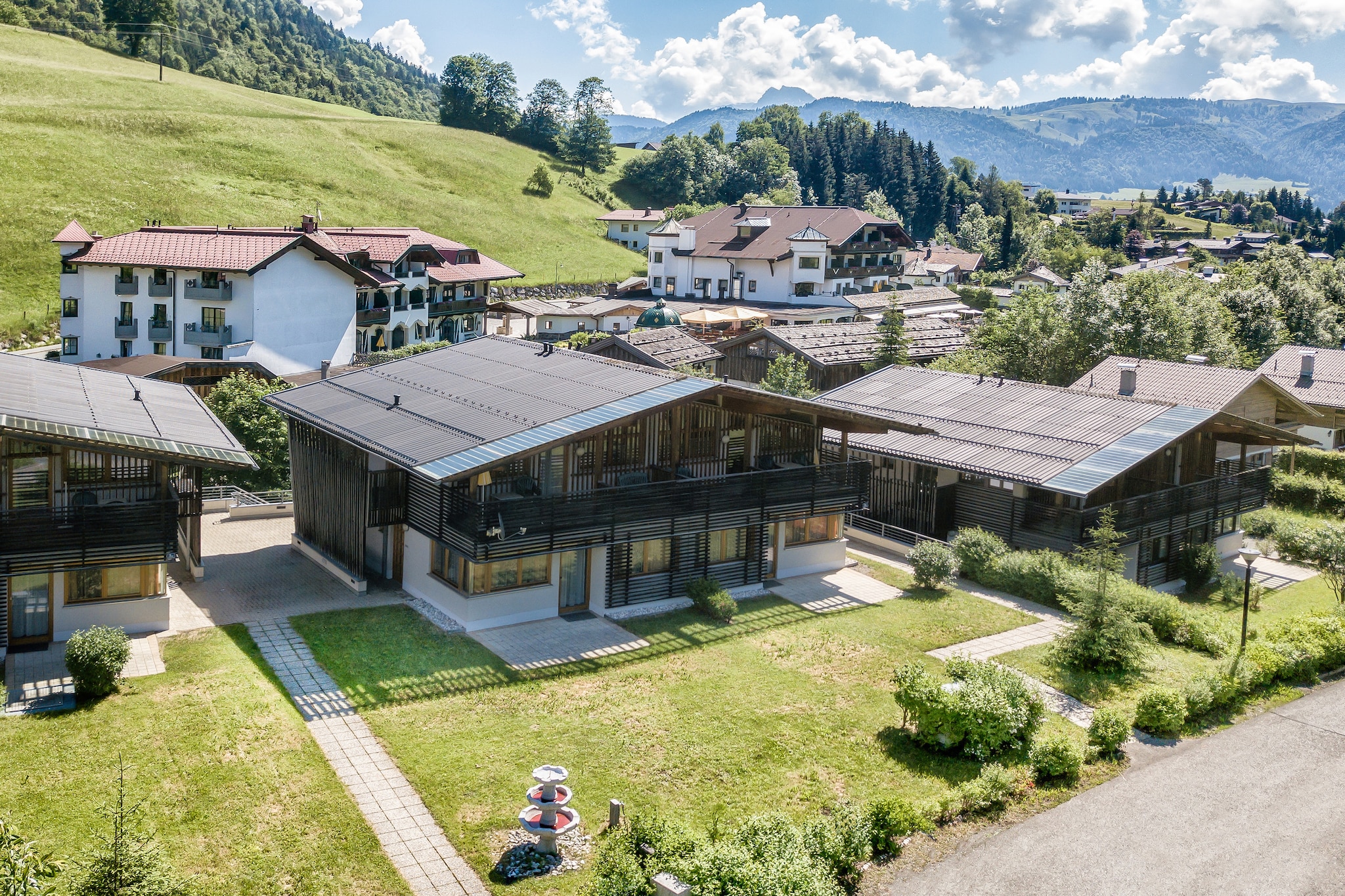 Modern apartment with garden and mountain views