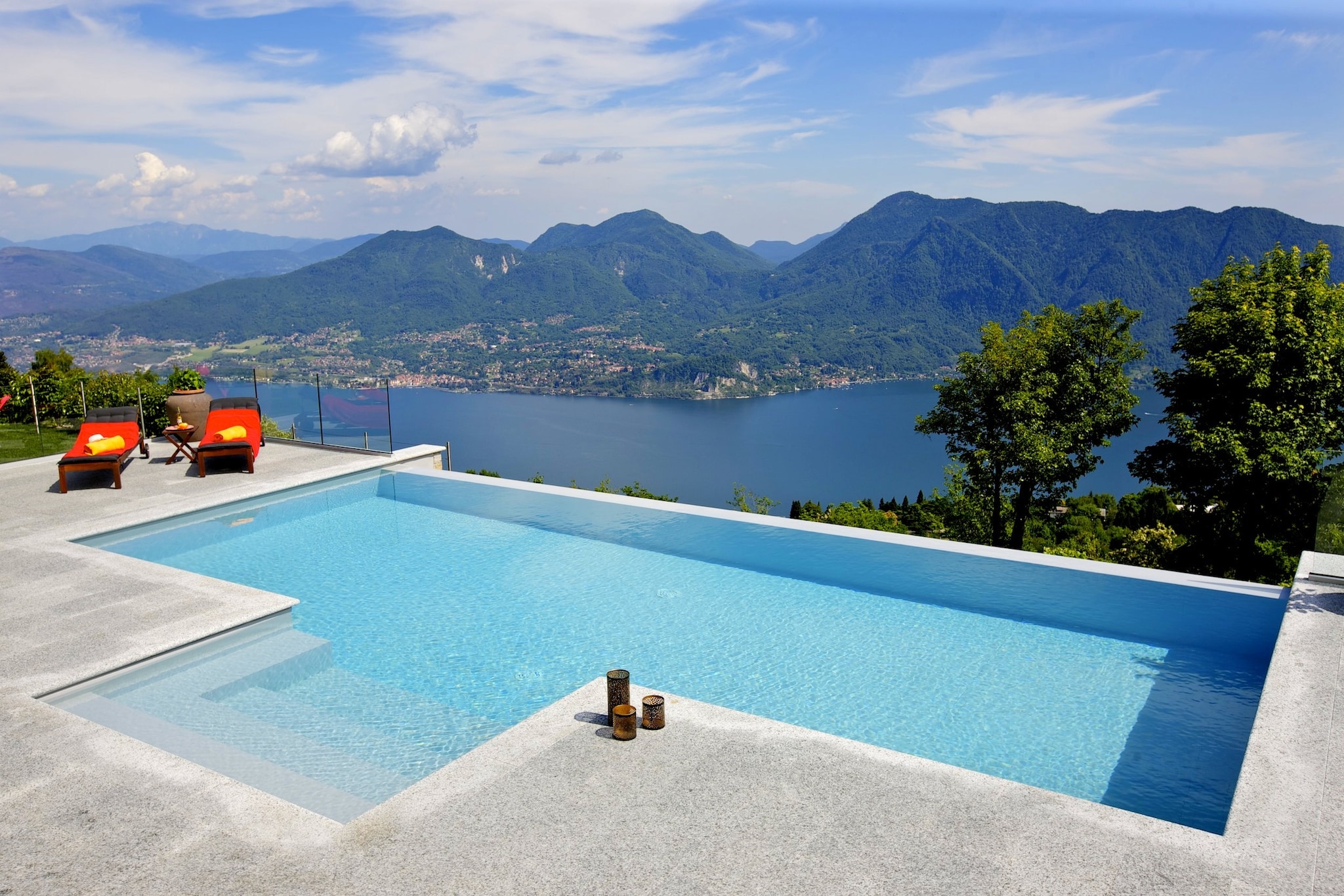 This 9-bedroom villa set in the Italian Lakes Region can accommodate 12 people comfortably. It is suitable for a joint family on a vacation and offers a swimming pool and sauna to unwind. 



There is a golf course as well as a tennis court in the vicinity, 500 m and 1 km away respectively. For a picnic, Lake Maggiore is nearby, just 2 km away. Other attractions of the region include Isola del Garda and Gardone Riviera. There are good restaurants at 1 km to try the local cuisine. 



The villa has a spacious living room and dining room. The fitness room comes with a bubble bath to relax. The villa also offers a furnished garden and 2 terraces amidst beautiful nature. The TV, CD player and radio will keep you entertained during your stay indoors. 



Malpensa Airport is 77 km. 



Check-in between 4 â€“ 6 PM and check-out between 8 â€“ 9 AM.
