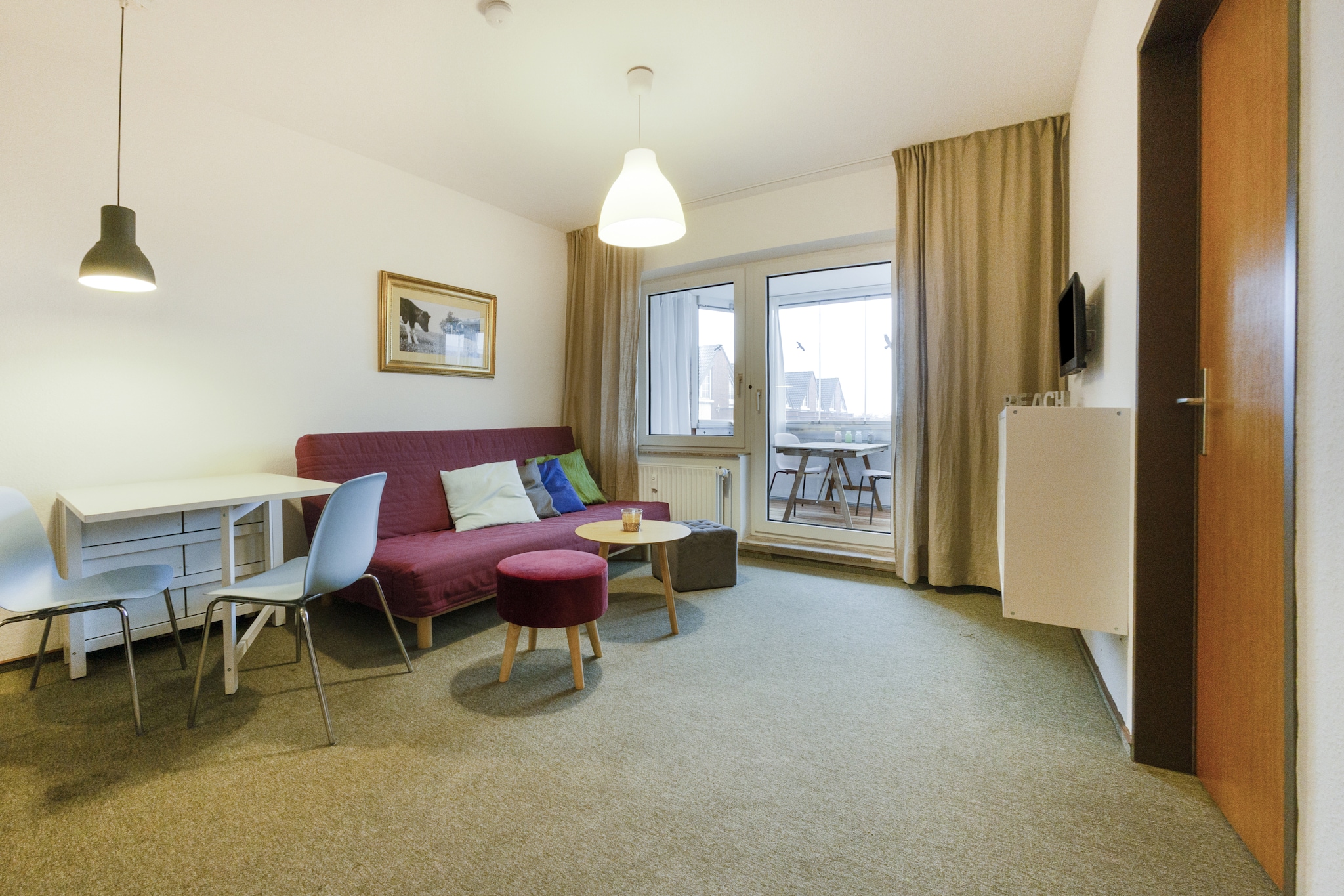 This cozy 1-bedroom apartment in Dornum is a perfect hideaway for couples seeking a quiet beach retreat. Located just 1.5 km from Dornumersiel Beach, it features a private balcony ideal for morning coffee and sea breezes. The compact kitchen is fully equipped, and thoughtful touches like baskets above the shelf add charm. During summer, the apartment stays naturally cool, though it may not suit guests with mobility issues.
Nearby, the lively Bensersiel beach offers more dining options and a kite school for adventurous spirits. Local restaurants serving fresh seafood are just 450 m away, and a supermarket is within 700 m for essentials. Guests can securely store their bikes and enjoy easy access to Dornum’s relaxed coastal vibe.
With JadeWeser Airport 51 km away, this apartment is a great base for exploring the North Sea region. Whether you're sunbathing, cycling, or savoring local cuisine, Dornum offers a peaceful rhythm for your holiday.