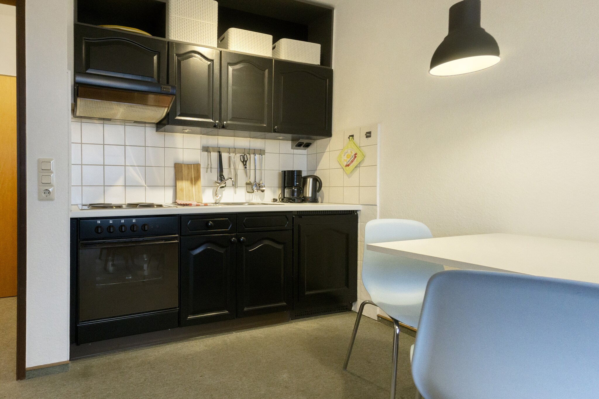 On the 2nd floor: (open kitchen(stove, toaster, coffee machine, oven, fridge-freezer), Living/diningroom(TV, seating area), bedroom(single bed, single bed), bathroom(shower, washbasin, toilet), balcony)\n\nheating, terrace, bicycle storage, parking