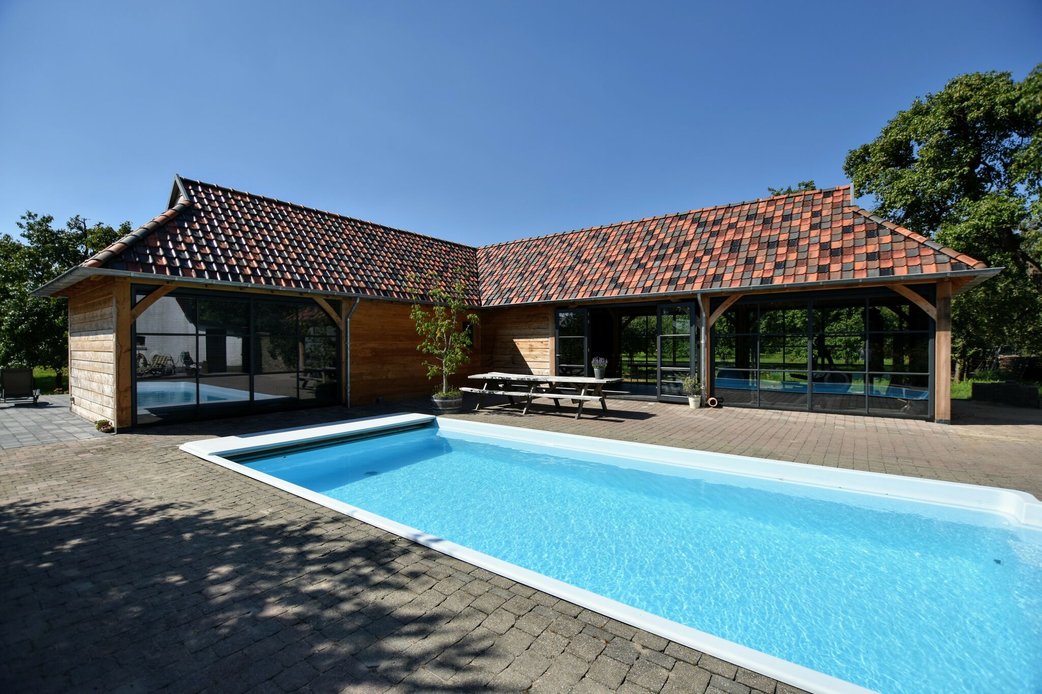 Maison de vacances spacieuse avec piscine à Herveld