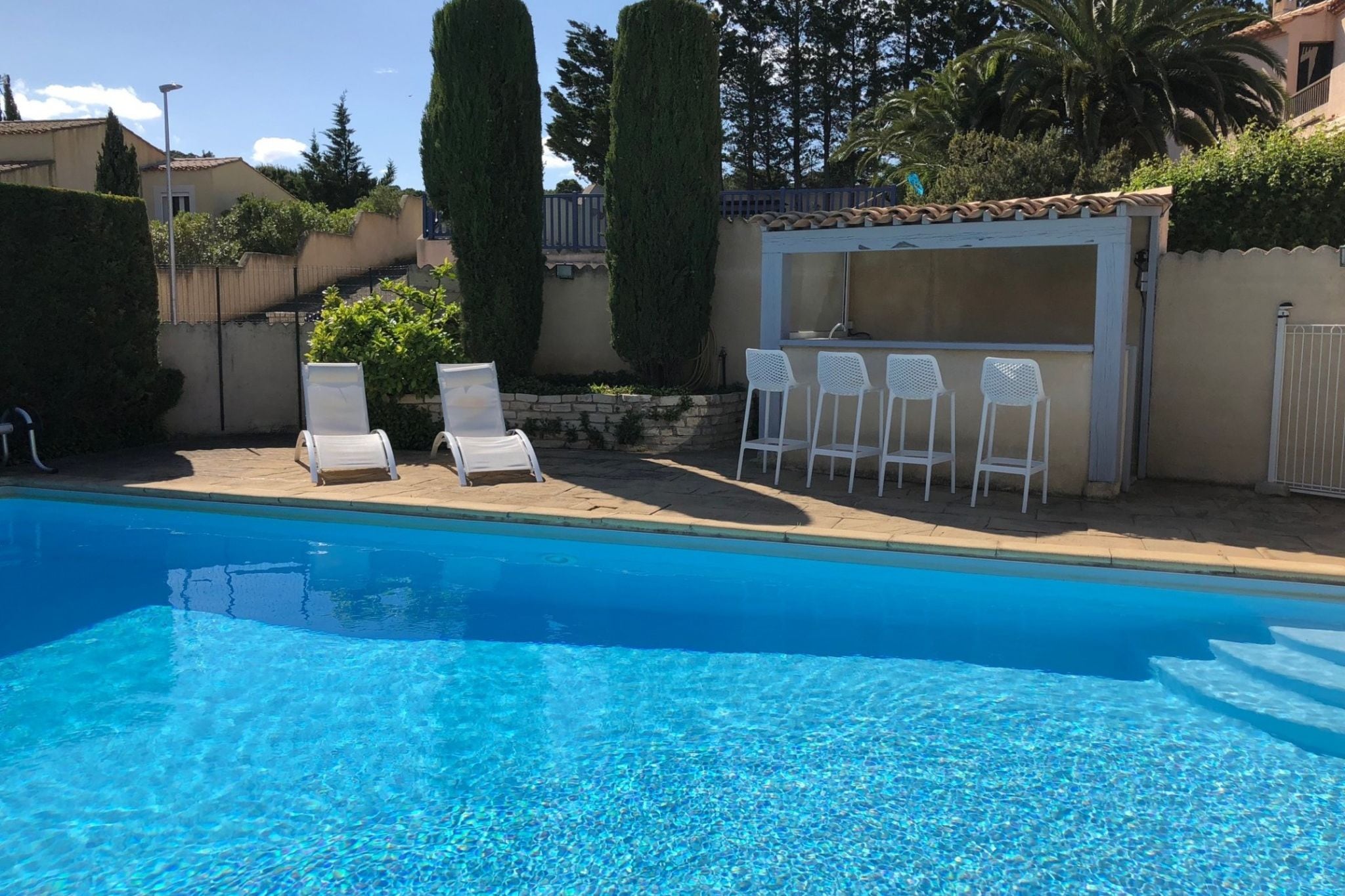 Holiday villa near Narbonne-Plage, fenced private swimming pool and view of a lake
