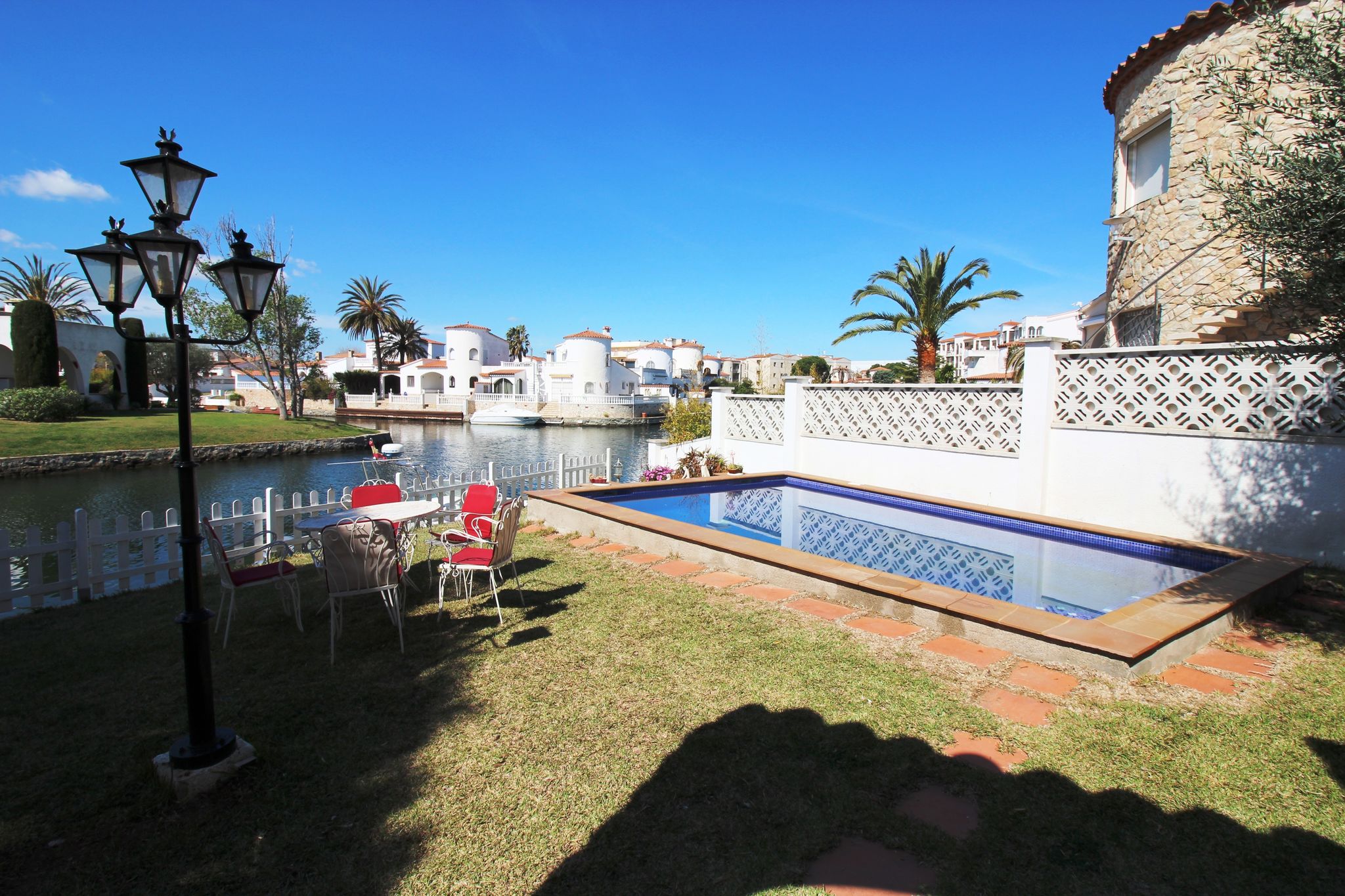 Majestic holiday home in Empuriabrava with private swimming pool, garden and mooring