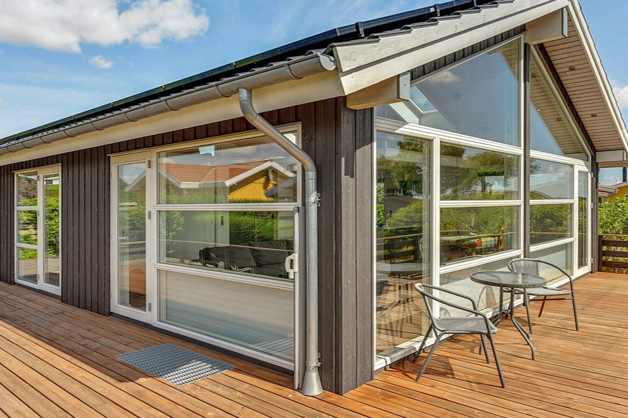 This cottage is located on an absolutely stunning plot with only approx. 90 meters to the beach at Hejlsminde. Here you will find a beautiful view both from inside the house and from the large terrace areas. The cottage is modernly decorated and the significance of the light is conceived in the form of the large panoramic windows and skylights. In the cottage you have 69 m2 on the ground floor but in addition there are also approx. 40 m2 activity room in the basement. Here you can find plenty of space for play and fun without getting cold feet, because there is underfloor heating. The living room itself and kitchen / dining area are stylishly furnished, and from the whole area you can see the sea. In the bedroom there is a built-in closet with sliding door and from the bedroom you can also go directly to the terrace. In the second bedroom there are bunk beds with a length of approx. 1.90. There is also a good loft with beautiful views. By the house, the outdoor life can be lived on the large terraces, which have direct access from the house. Behind the house you will find a cozy courtyard. There are a total of 120 m2 of terraces, of which 40 are wooden terraces. There are beautiful views of the sea from both terraces. There is also an outdoor shower so you can cool off on a hot summer day (available during the summer). Not for rent to youth groups.

A refundable deposit might be charged closer to your check-in date. This deposit covers utilities consumed during your stay and any additional services that may be taken. The final amount will be adjusted based on actual meter readings, actual usage of extra services, and any remaining balance will be refunded within 21 days after checkout.