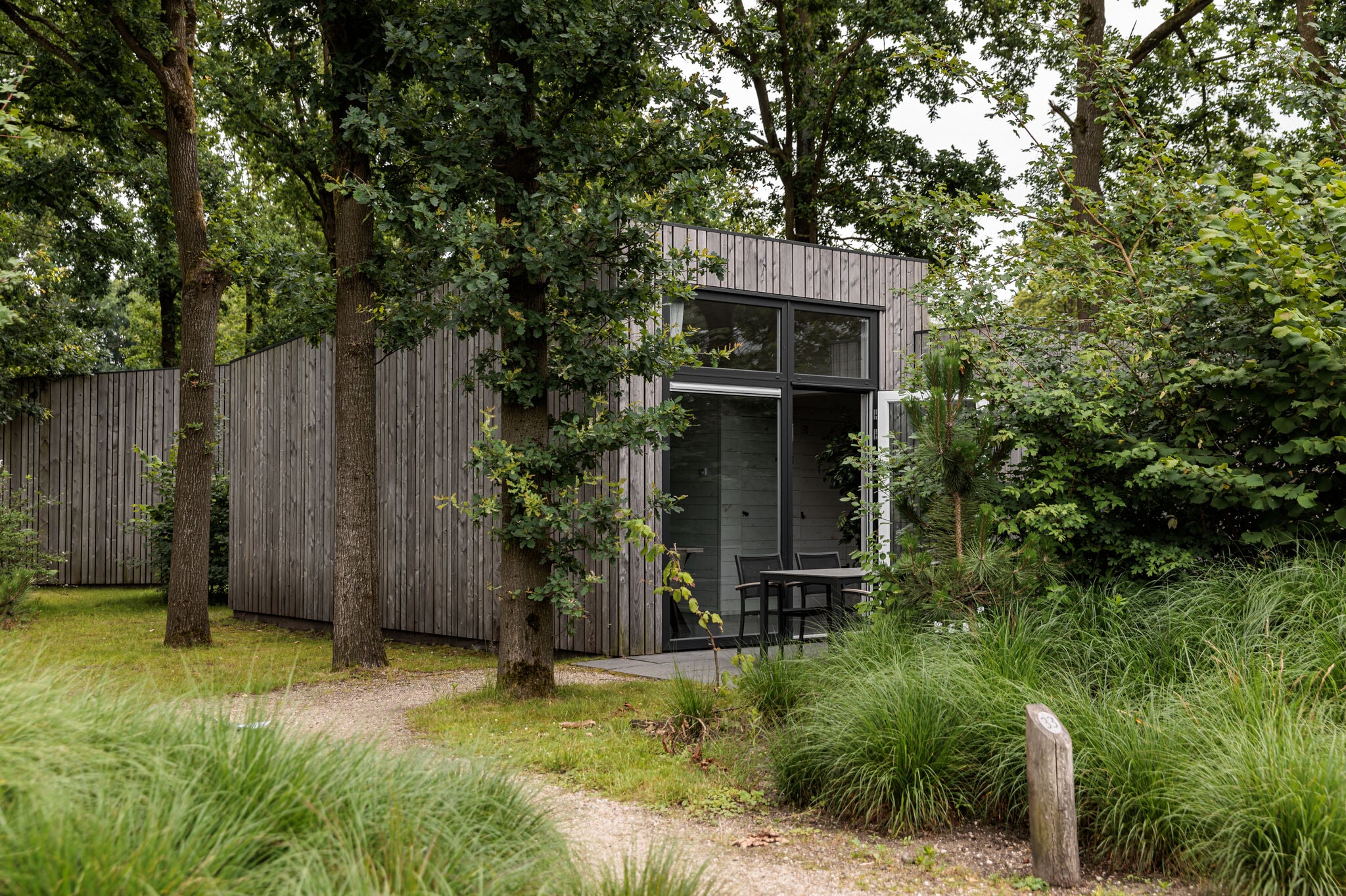 Modern lodge with combi-microwave within green surroundings