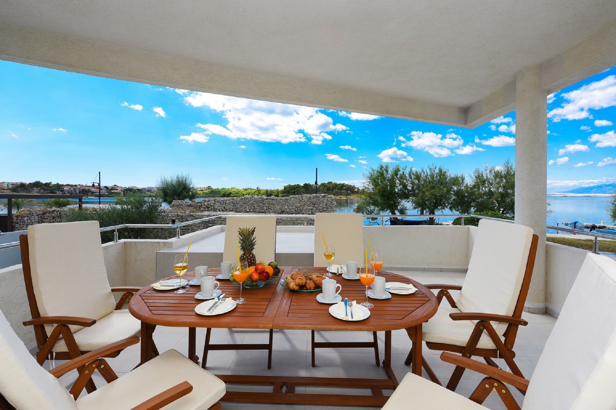 This villa with roofed terrace and amazing sea views is located in the small historical place, Nin. There are 3 bedrooms, which can sleep 8 people, making this place an ideal place to stay for large families on a coastal vacation.



By staying at this villa, you are steps away from the sea. The nearest beach where you can go to sunbathe is 300 m away. The town centre and other facilities are 100 m away. Zadar town is 15 km away and can be visited on a day trip. Many natural parks located nearby can be visited on day trips. 



The sea-front villa has a roofed terrace, where everyone can enjoy delicious meals cooked in the fully-equipped kitchen, while treating your eyes to stunning views. Barbecue, shared with other guests offer sizzling meals. The air-conditioned villa also has a balcony in one of its bedrooms. Washing machine is also available to take care of your laundry. 



Zadar Airport is 20 km away.



You can check into this villa between 4-11 PM and check out between 8-10 AM.

