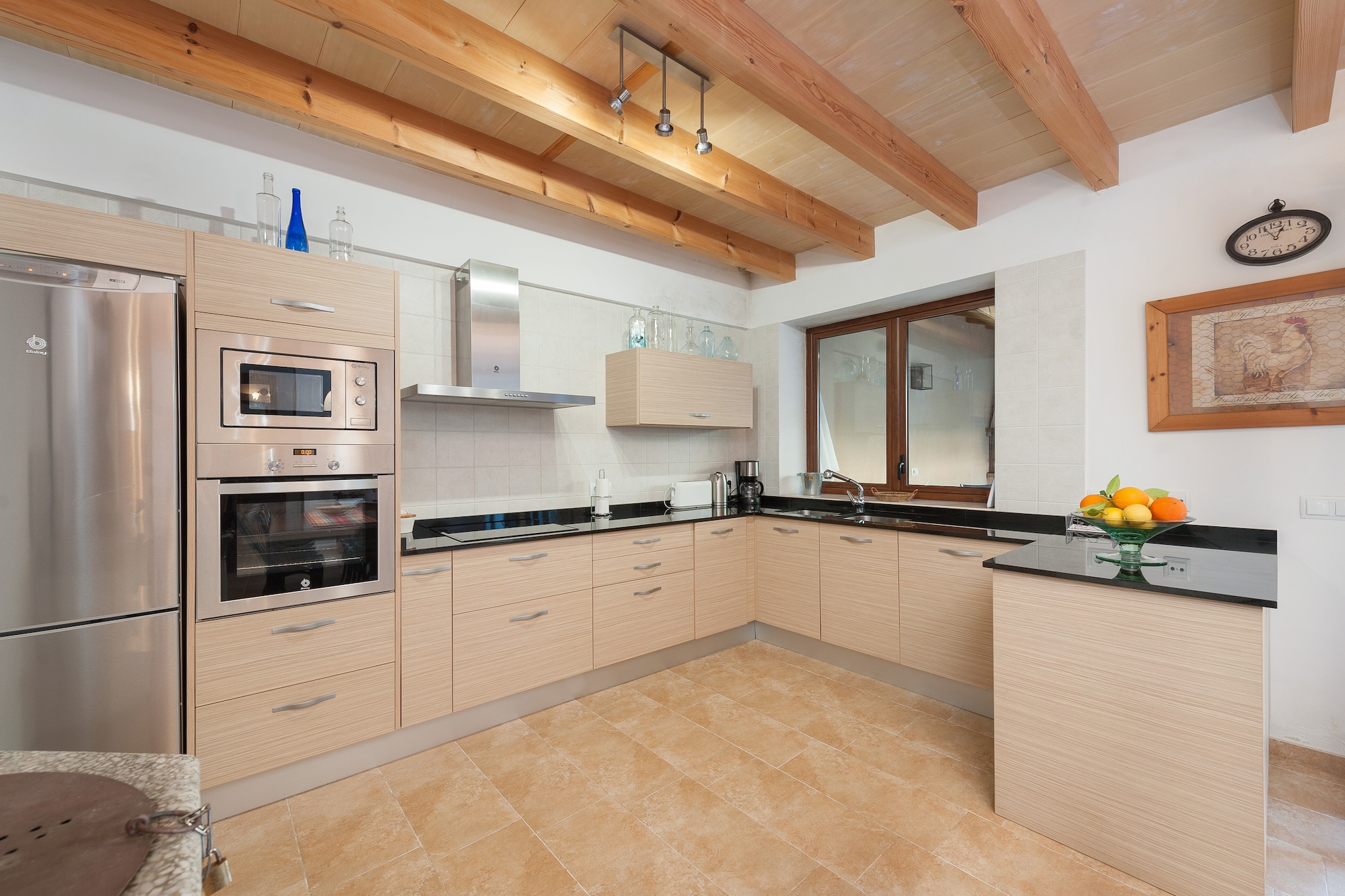 Living room, Living room, Kitchen(cooker, coffee machine, oven), bedroom(double bed), bedroom(double bed), bedroom(double bed), bedroom(double bed), bathroom, bathroom, microwave, dishwasher, fridge-freezer, bath tub, shower, washbasin, washbasin, toilet, toilet, bidet, air conditioning, air conditioning, air conditioning, BBQ, children\'s bed, high chair