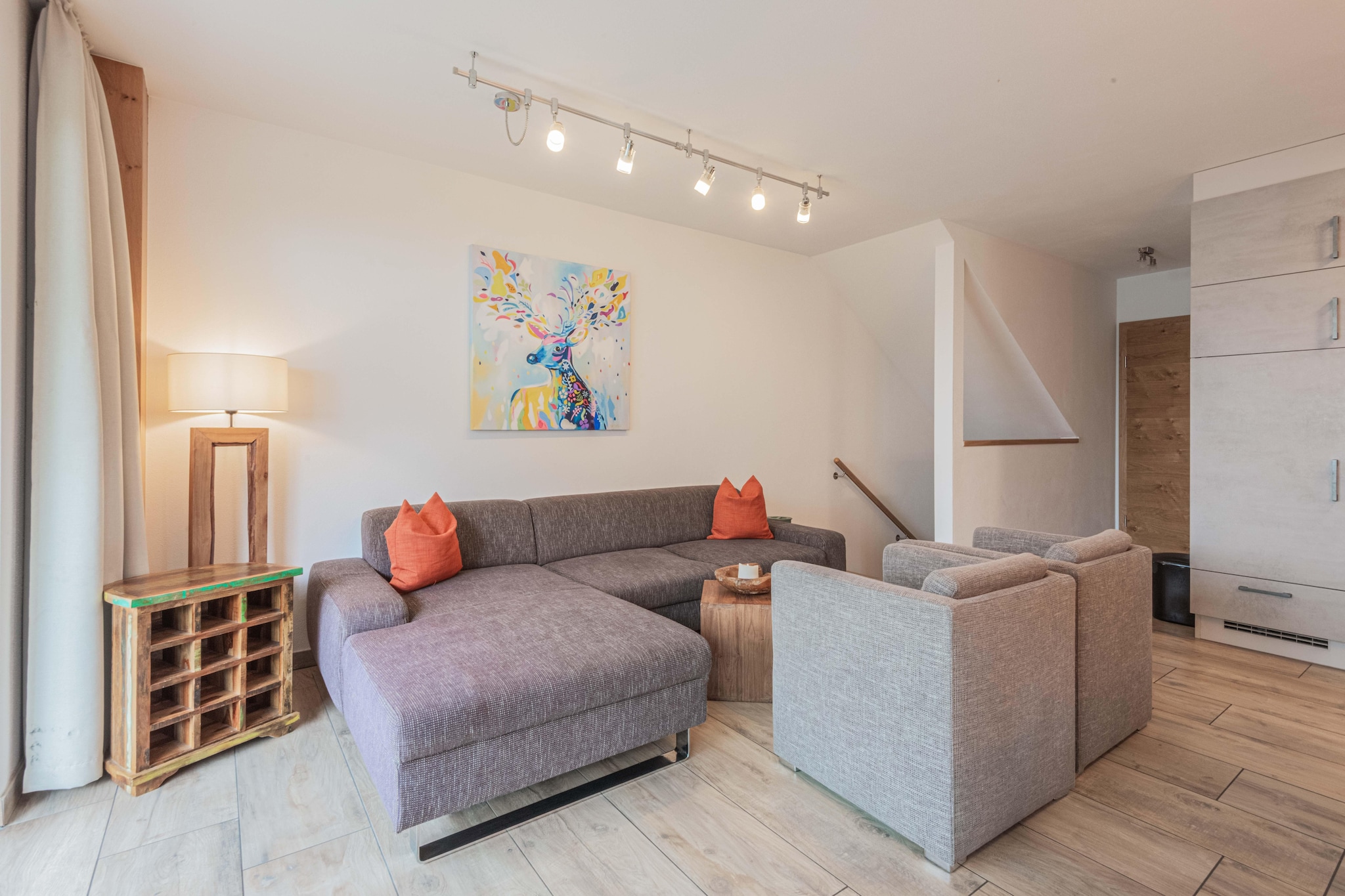 Ground floor: (Entrance(reachable from the outside), Living room(TV(flatscreen), dining table), open kitchen(electric kettle, toaster, cooker(4 ring stoves, ceramic), coffee machine(cups, filter), oven, microwave, dishwasher, fridge-freezer), Bedroom with bathroom(double bed, shower, washbasin, toilet), toilet, terrace)\n\nOn the 1st floor: (bedroom(double bed), bedroom(double bed), Bedroom with bathroom(double bed or 2 single beds, shower, washbasin, toilet, balcony), bathroom(shower, washbasin, toilet))\n\nBasement: (relaxation area(shower, sauna, deckchairs), ski storage)\n\ntumble dryer, washing machine, balcony, terrace, garden, garden furniture, sun loungers, parking, Charging post for electric cars