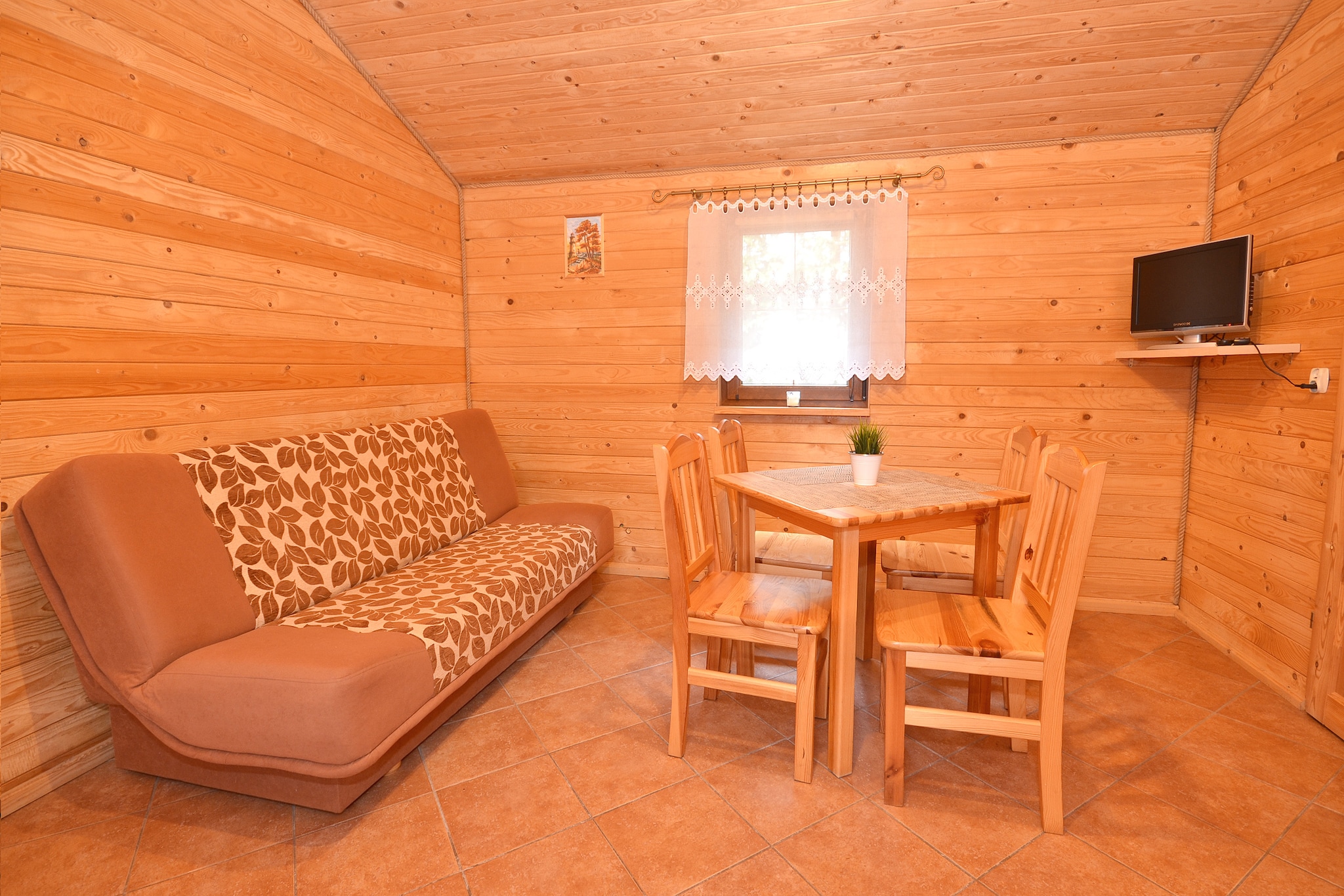 This cosy bungalow in Darlowo Baltic Coast has 1 bedroom and can accommodate 4 people. Located near the Baltic beach, it is ideal for a family holiday and features a garden and grill. Children will have great fun on the playground, jumping on the trampoline, playing tag, running barefoot on the grass, playing ping pong, table football, cycling to the nearby forest or the sea. Parents will be able to relax using hammocks or deckchairs. 

With the proximity to Baltic beach, you can be assured of an enjoyable seaside vacation. You can also go fishing on the nearby Wieprza River. 

Enjoy sunbathing in the garden or take a siesta on the deckchairs. Table football, volleyball court and swing set are there for kids enjoyment. Parking is on-site in the fenced area. Cot and high chair are available on request. Throw waste in the sorting bins at the entrance gate. All your kitchen essentials and water supply are taken care of. 

About Belvilla

When you stay in a Belvilla home, you can rest assured of a unique holiday home in ideal surroundings at an attractive price. The portfolio of accommodations consists of more than 40,000-holiday homes in 20 European countries. Interested in a weekend getaway, a summer or winter sports holiday or simply a short break? Do you prefer the coast, the countryside or the mountains? Whatever your preference, there is a Belvilla home to meet your needs, from a cosy gÃ®te for two to a castle big enough for the entire family, from an apartment in the heart of Rome to a cabin in the middle of nowhere, from a simple tree house to a luxury dream villa and from close to home to the other side of Europe.

A Belvilla home gives you the freedom to enjoy breakfast in your pyjamas or continue a good conversation into the morning hours without having to worry about the bar's closing time. Prepare gourmet meals with fresh local ingredients in your own kitchen and take advantage of having your own swimming pool to do as many cannonballs as you want! In other words, you can enjoy complete privacy in your home away from home.