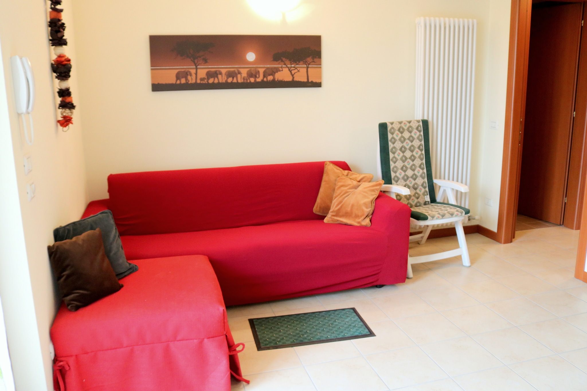 With 2 bedrooms, this is a holiday home in the beautiful, atmospheric town of Lazise. After returning from excursions, you can take a refreshingly cool dip in the shared swimming pool. This stay is suitable for 5 persons, be it a family or a group of friends. 
Lazise is famous not only for the love of Lake Garda, beach life, and water sports but also for its special atmosphere and beauty. When you don't cook, restaurants are at 0.4 km. To spend a day admiring nature, the lakeside is 1 km away. The town center of Lazise rests at 1 km if you wish to go for a stroll in the evening. For a fun-filled day, you can visit Caneva Aquapark, Movie Land Park, or Gardaland Park. 
The holiday home has central heating and air-conditioning for comfort in all seasons. There are 2 furnished private terraces where you can have your meals and linger all day long. Children can play around with full energy in the shared garden while you read a book in the corner. You can park your car in the garage.