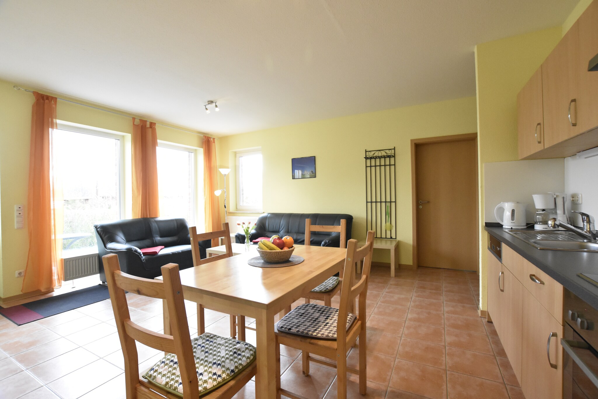 Ground floor: (open kitchen(electric kettle, toaster, cooker(ceramic), coffee machine, oven, dishwasher, fridge-freezer), Living/diningroom(TV(flatscreen), dining table(4 persons), fireplace, seating area, DVD player, radio, CD player), bedroom(double king size bed(180 x 200 cm)), bedroom(2x single bed(90 x 200 cm)), bathroom(shower(walk-in shower), sauna, washbasin, toilet))\n\ngrill, cot, terrace, garden(fenced), garden furniture, parking, high chair, outdoor fireplace