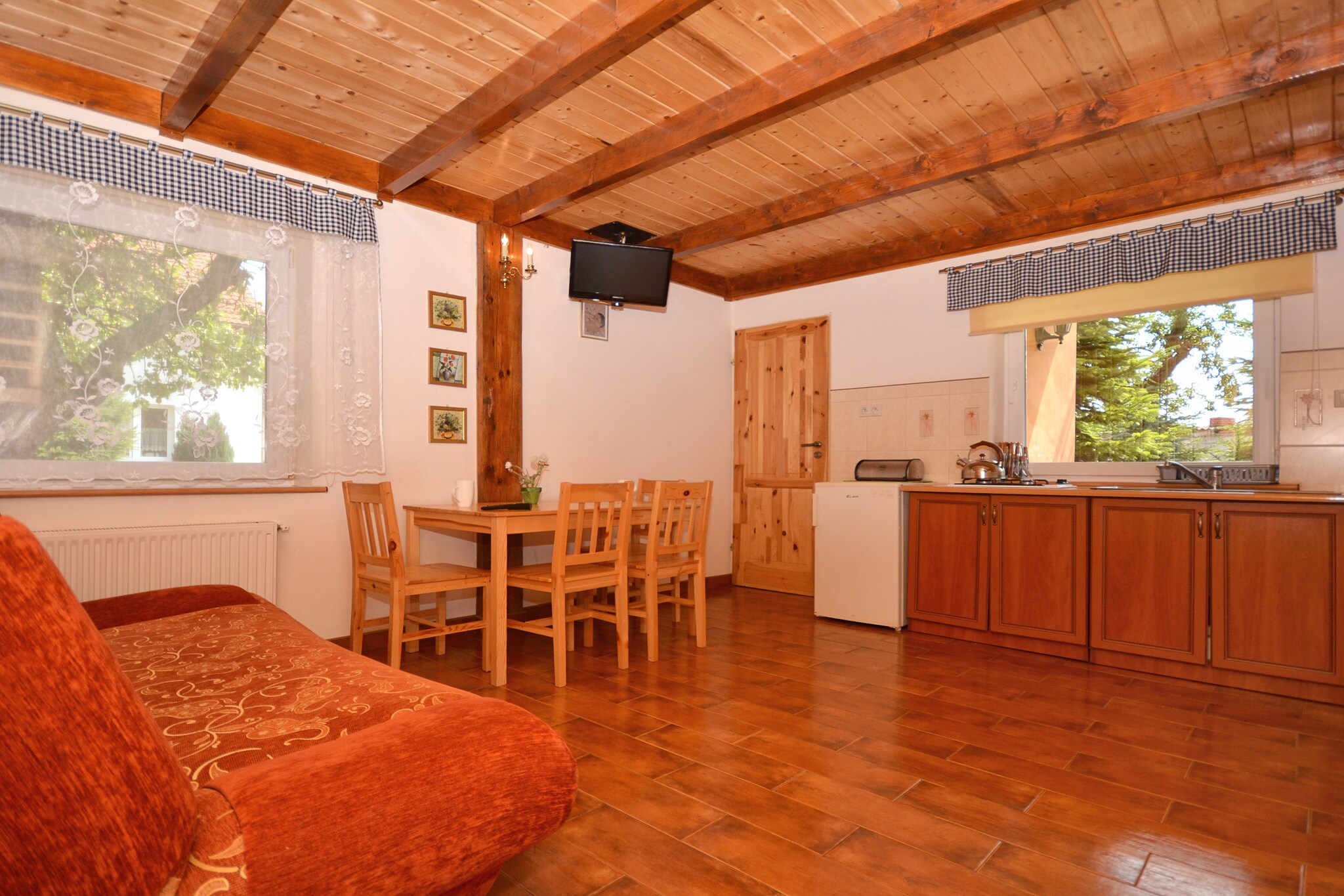 A quiet cottage in a seaside village. Living room, two bedrooms, a large garden.