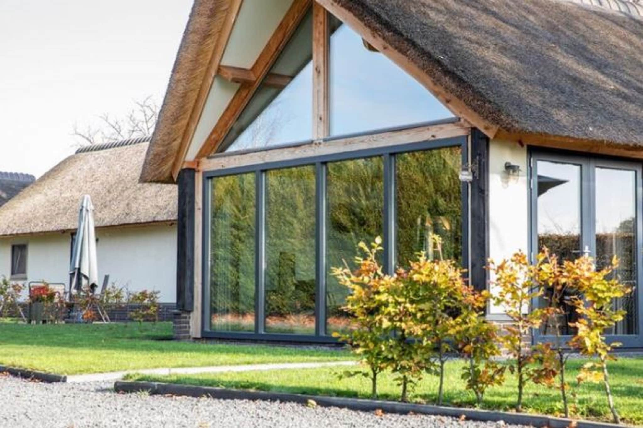 Located in Alphen-Chaam, this modern holiday home is perfect for a family getaway. It can accommodate up to 4 guests and has 2 bedrooms. This home offers a lovely seating area for you to spend some quality time with your dear ones.
This modern and renovated home has a hallway, an open kitchen, a living-cum-dining room , 2 bedrooms and stables to make the most of your holiday. Besides the free WiFi, this home also offers combination microwave, dishwasher, coffee machine and washing machine (shared) for your convenience. You can make use of the parasol to soak up some lovely winter sun.
The guests can check-in from 4-8 PM and check-out can be done from 9-10 AM.
Smoking is not allowed