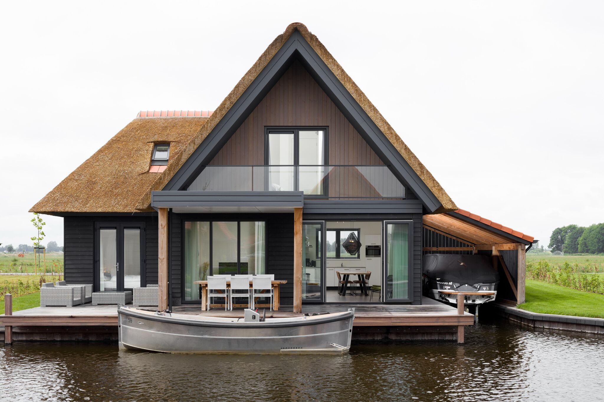 Modern watervilla with three bathrooms, at the Frisian Lakes
