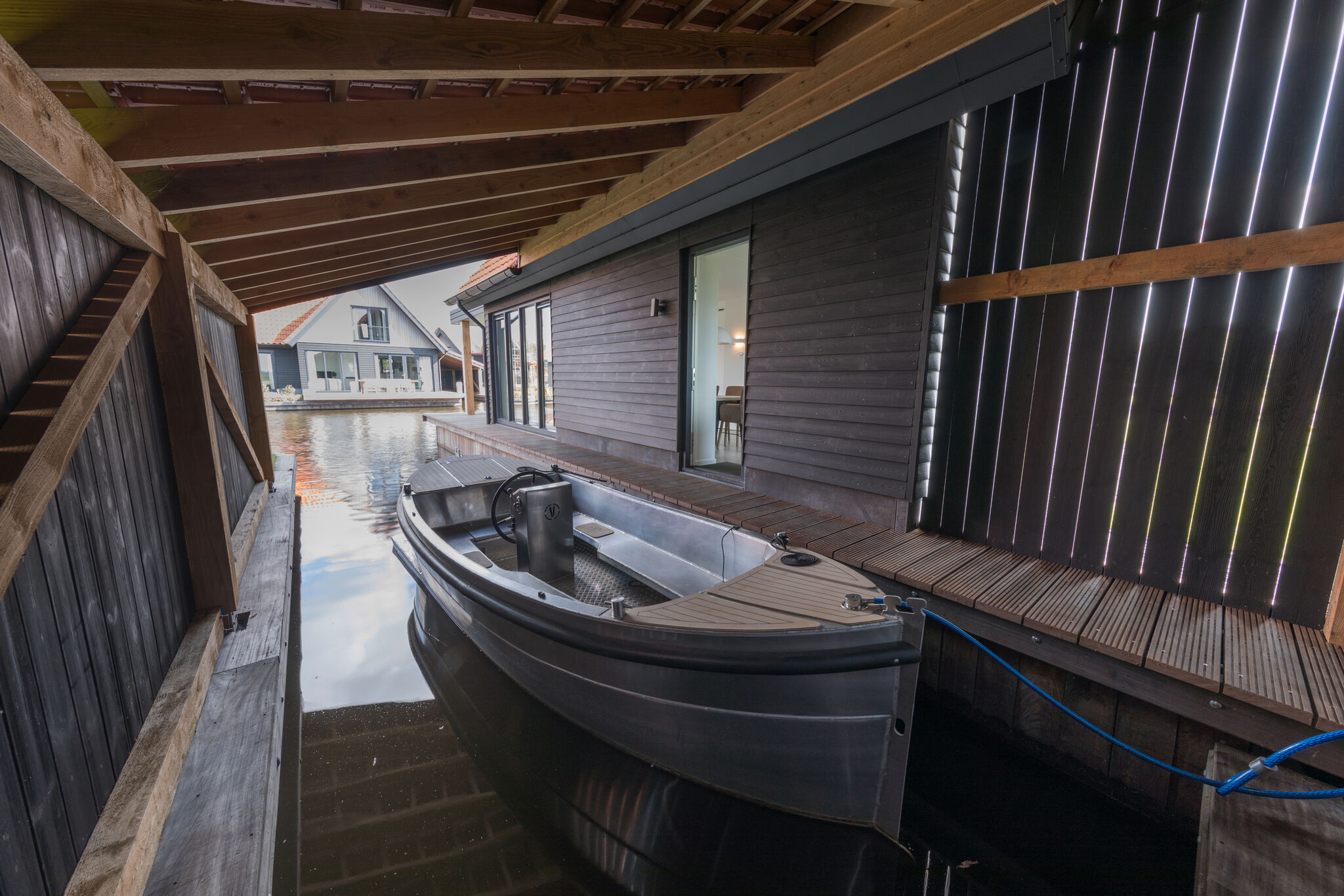 Modern watervilla with three bathrooms, at the Frisian Lakes