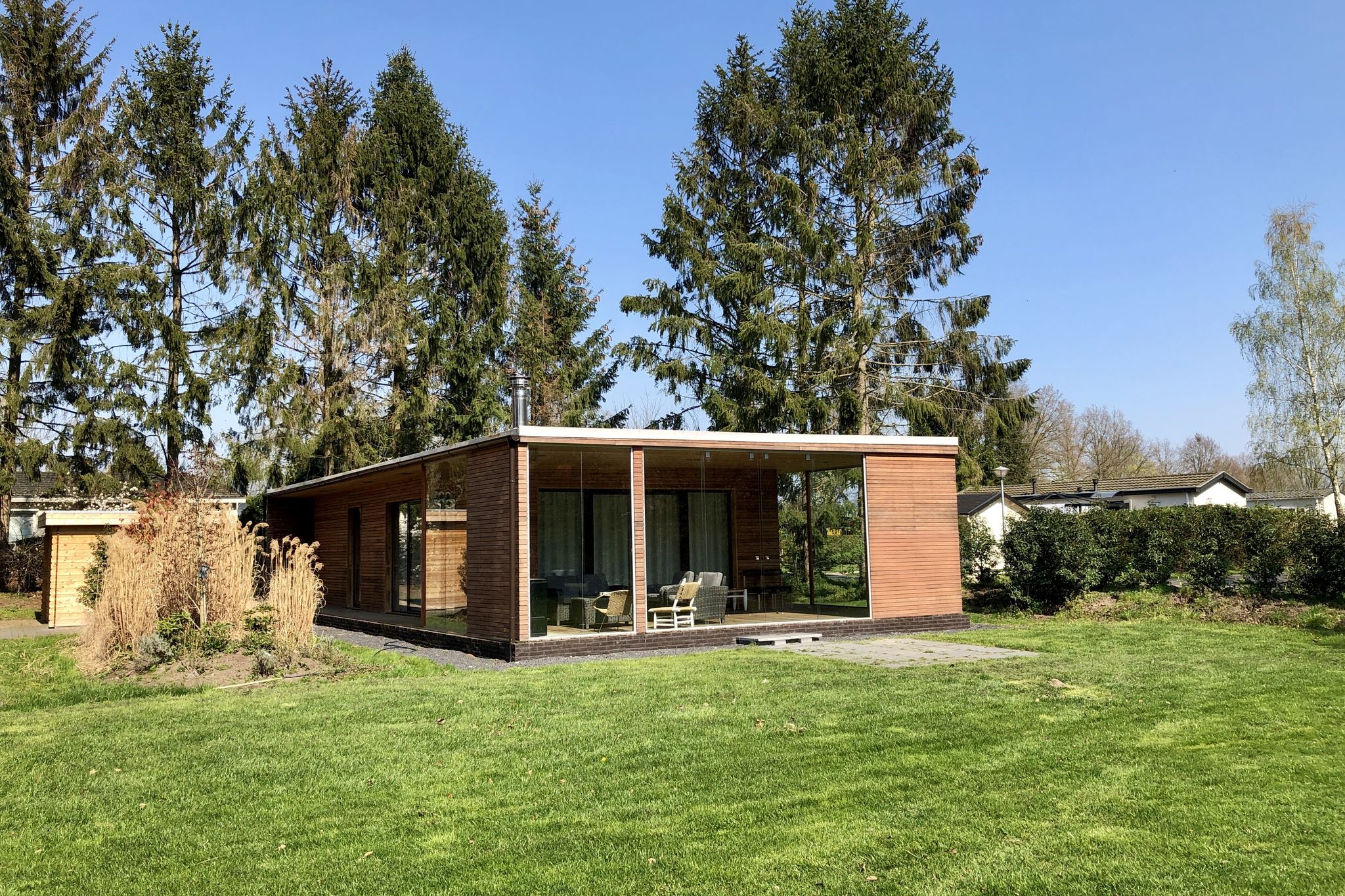 Modern lodge with wood stove near Almelo