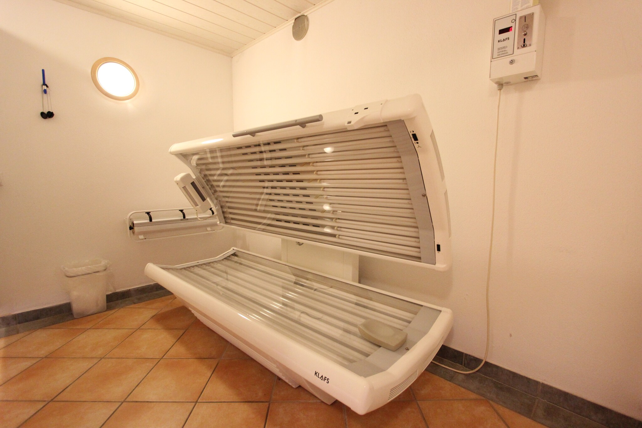 On the 1st floor: (Kitchen(electric kettle, cooker(2 ring stoves), coffee machine, fridge), Living/diningroom(TV, dining table), bedroom(single bed, single folding bed, double bed), bathroom(shower, washbasin, toilet))\n\nBasement: (relaxation area(shared with other guests)(deckchairs), shower(shared with other guests), solarium(paid), sauna)\n\ngarden(shared with the the owner and other guests), parking, parking, play equipment