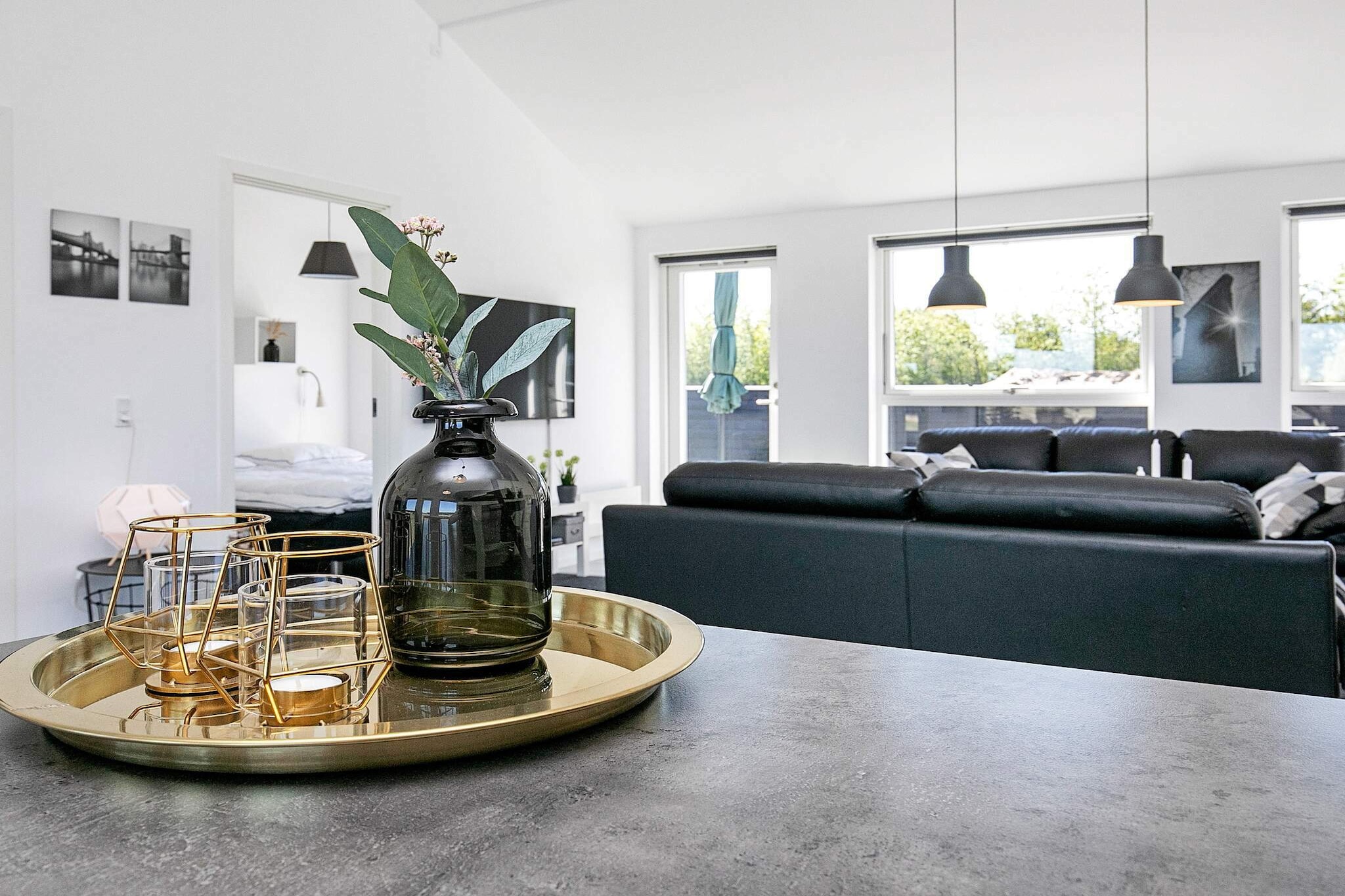 open kitchen(cooker(electric), hood, coffee machine, microwave, dishwasher, fridge-freezer), Living/bed room(TV(german television channels, danish TV channels (DR1 and TV2)), radio, high chair), bedroom(double bed), bedroom(double bed), bedroom(double bed), bathroom(floor heating)(bathtub or shower, washbasin, toilet, washing machine), bathroom(floor heating)(bathtub or shower, washbasin, toilet), Bubble bath(indoor, heated, 2 persons), sauna(indoor, heated, 2 persons), heating(electric), terrace, BBQ, table tennis table, air hockey, darts, billiards, air to air heatpump