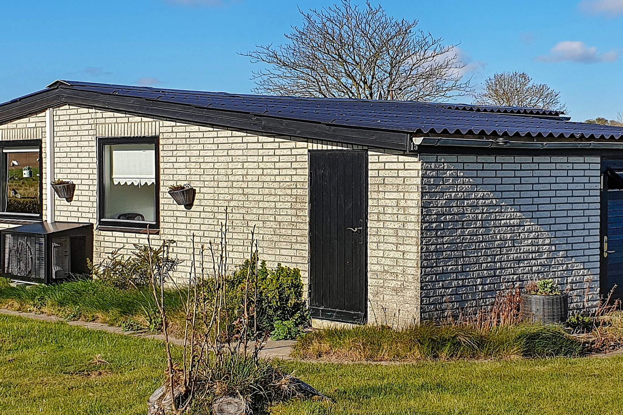 open kitchen(cooker(electric), hood, coffee machine, fridge(+ freezer)), Living/bed room(TV(german television channels), radio), bedroom(double bed), bedroom(2x bunk bed), bathroom(bathtub or shower, washbasin, toilet), shower(outside), terrace, BBQ, geothermal energy, air to air heatpump