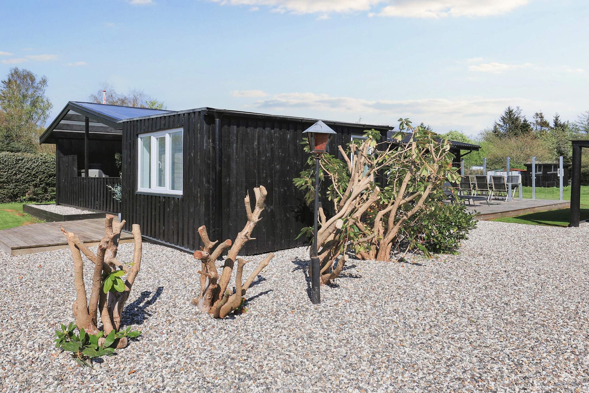 This modern holiday home is in Jutland, Nordjylland, Denmark. There are two bedrooms that can comfortably accommodate 4 guests. Ideal for friends or families, there is a roofed terrace where you can sit with your pals enjoying the delicious food. It is also situated on a beautiful large lawn.



This house is located in a quiet, child friendly environment. It is just 1 km from the sea, ideal for a beach holiday or if you want fresh air in the spring or autumn delicious. From here you can also spend a day at the larger towns nearby, such as Aalborg. Restaurants and supermarkets are less than 4 km from the house.



The house was renovated in 2019 and is fully equipped. The living room has a cozy fireplace and a TV with both Danish and German channels. The decorative fireplace will keep you warm in the winters. The air-to-air heat pump will keep the environment clean.

A refundable deposit might be charged closer to your check-in date. This deposit covers utilities consumed during your stay and any additional services that may be taken. The final amount will be adjusted based on actual meter readings, actual usage of extra services, and any remaining balance will be refunded within 21 days after checkout.