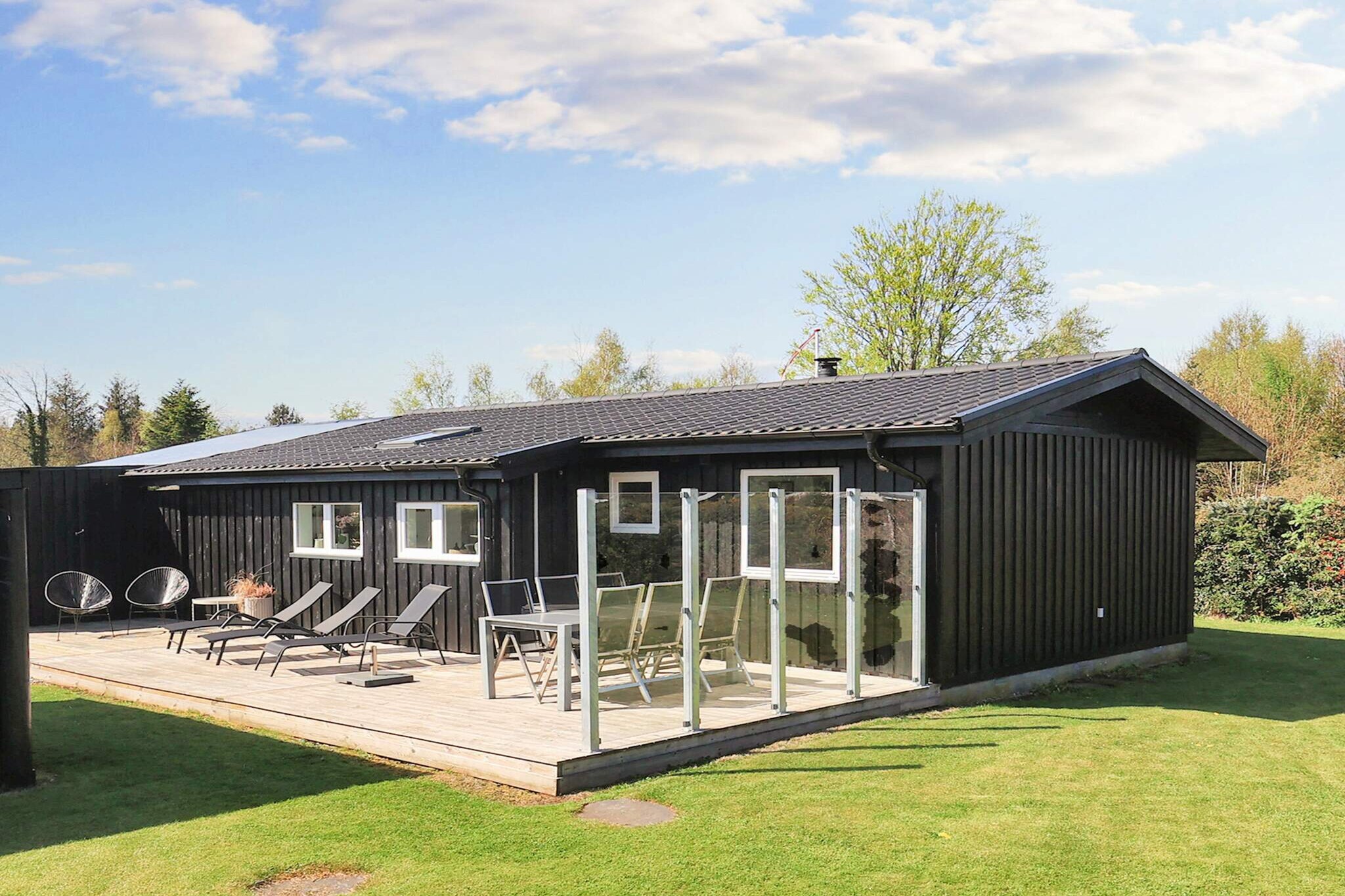 Annex: (double bed)\n\nopen kitchen(cooker(electric), hood, coffee machine, microwave, dishwasher, fridge, freezer(60-99L)), Living/bed room(TV, chromecast), bedroom(double bed), bedroom(2x single bed), bathroom(floor heating)(bathtub or shower, washbasin, toilet, washing machine), heating(electric), terrace(roofed), BBQ, air to air heatpump